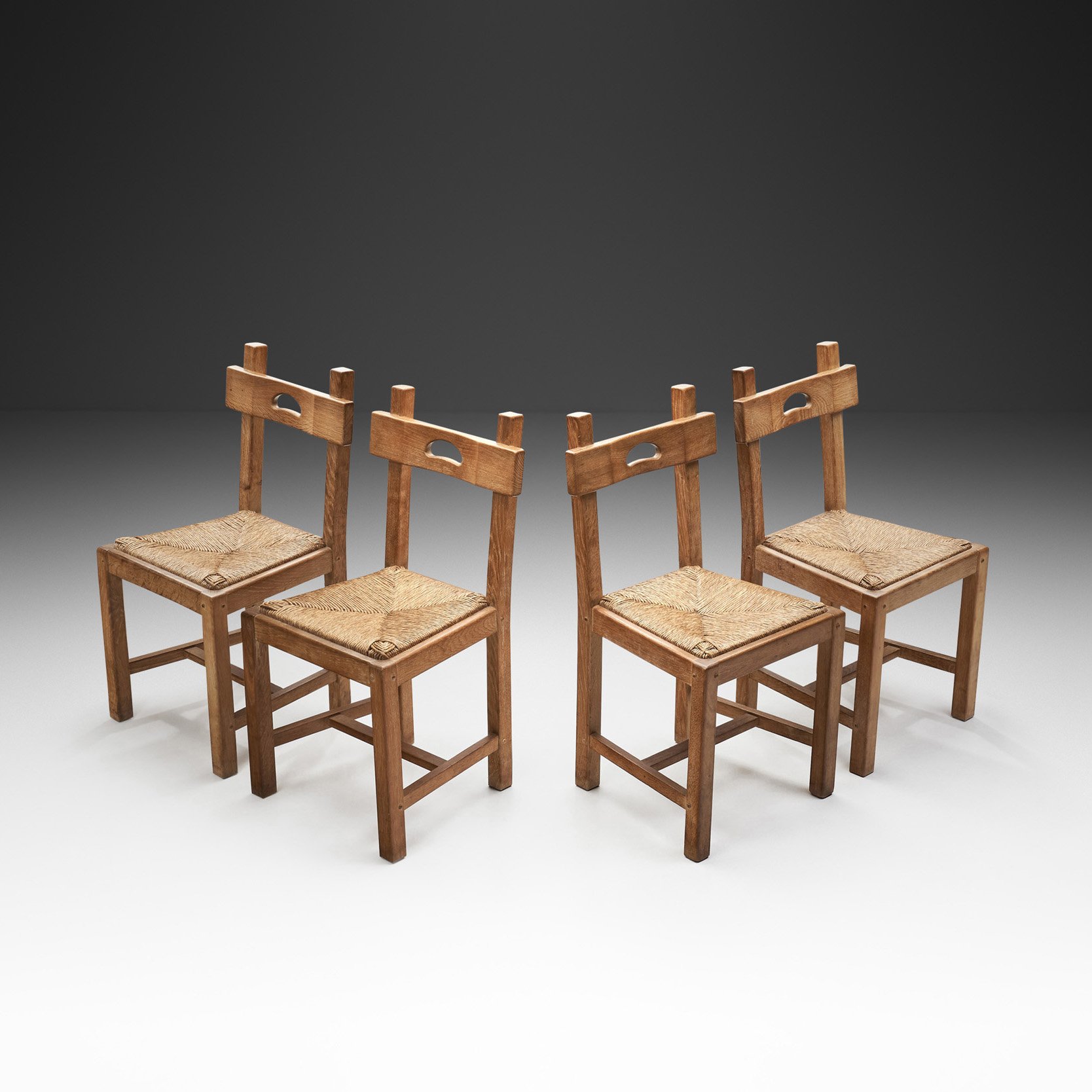 Set of Four Wood and Woven Rush Dining Chairs, Europe ca 1950s