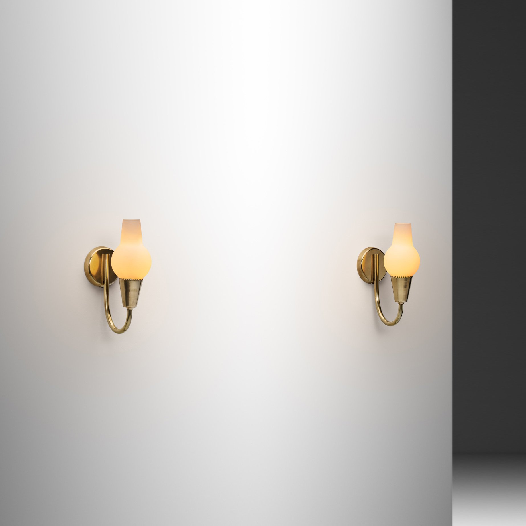 Pair of Brass and Opal Glass Wall Lamps by Bent Karlby (Attr.) for Lyfa, Denmark Mid-20th Century