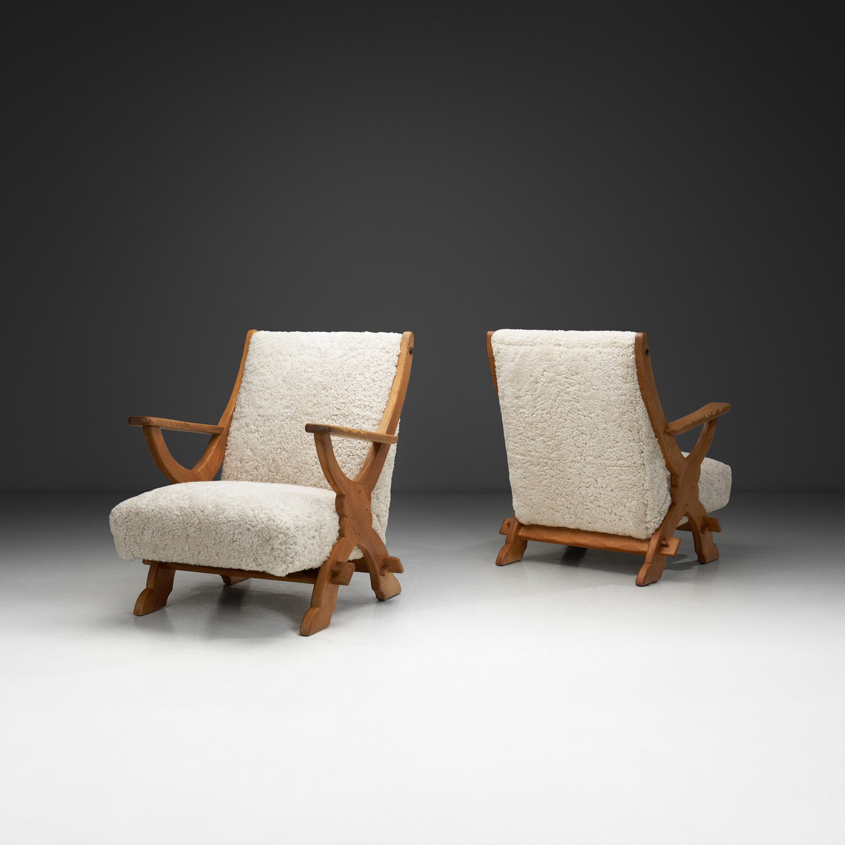 Pair of Wood and Sheepskin Lounge Chairs, Europe Mid-20th Century