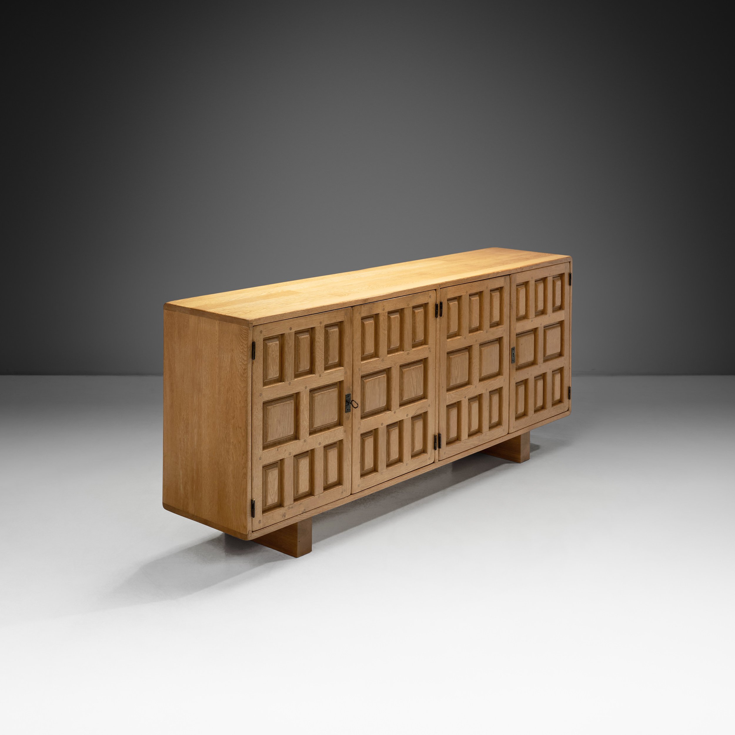 Spanish Brutalist Panel Cabinet in Oak with Geometric Doors, Spain 1960s (sold)