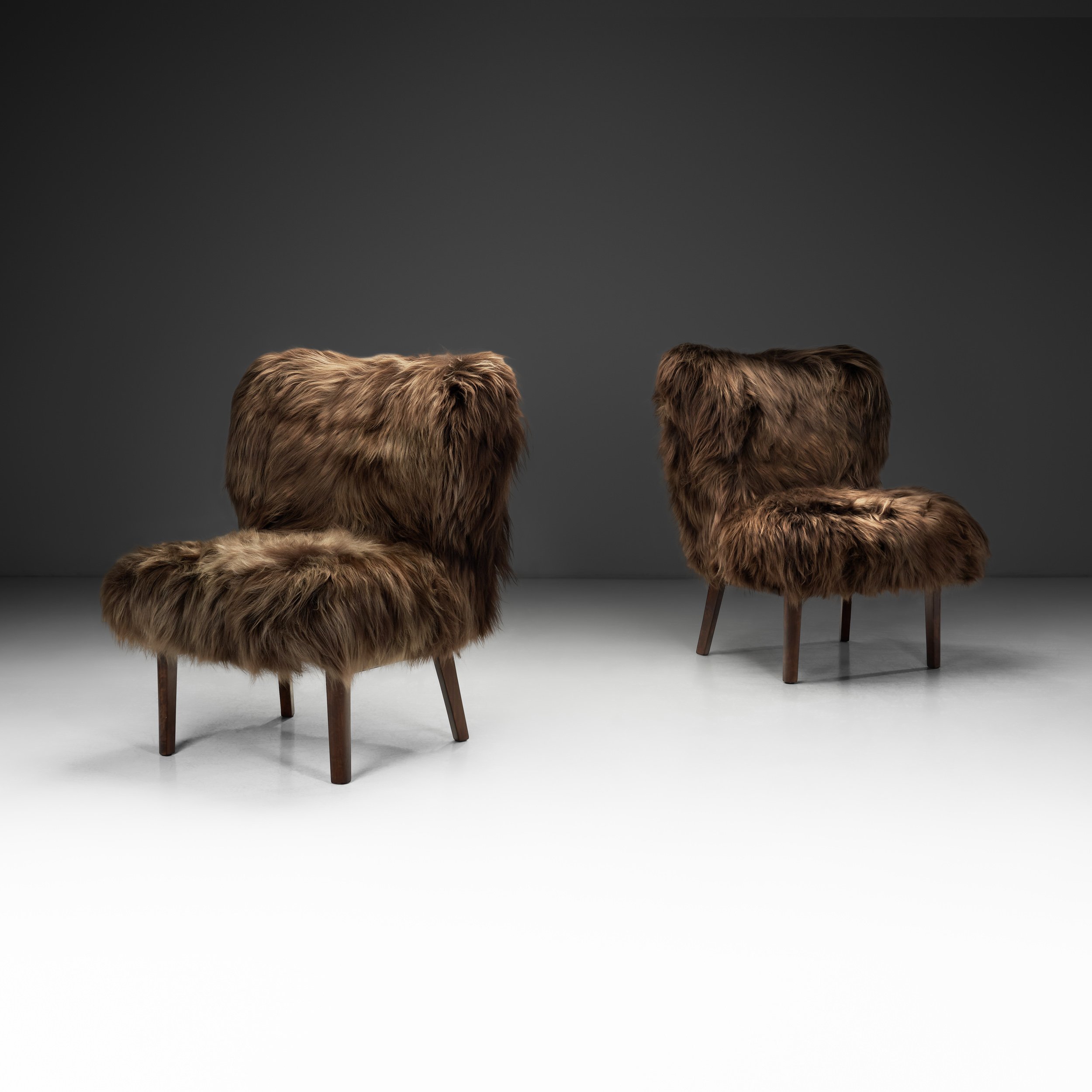 Pair of Easy Chairs Upholstered in Sheepskin in the manner of Erik Bertil Karlén, Sweden 1940s