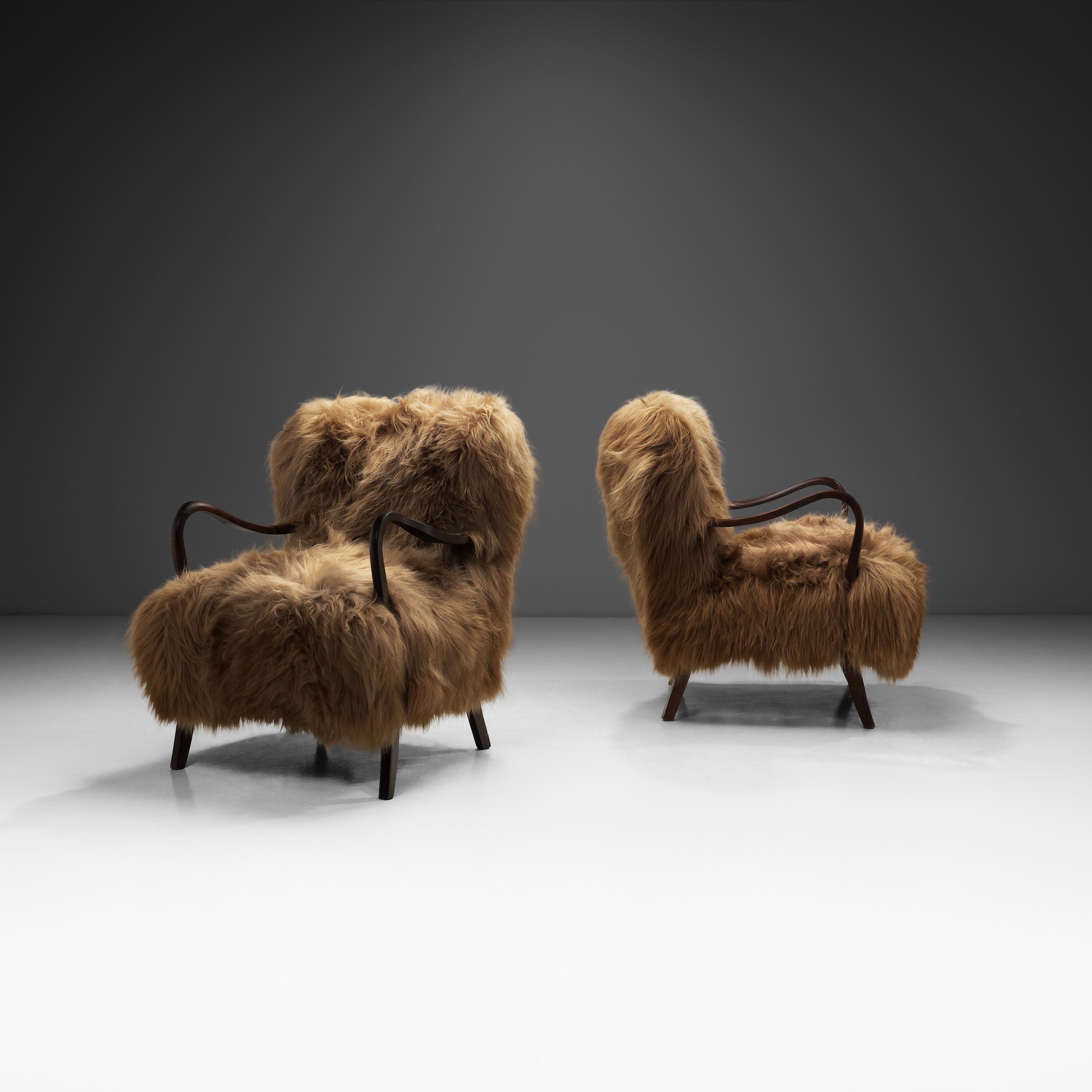 Pair of Danish Easy Chairs Upholstered in Longhair Sheepskin, Denmark 20th Century (sold)