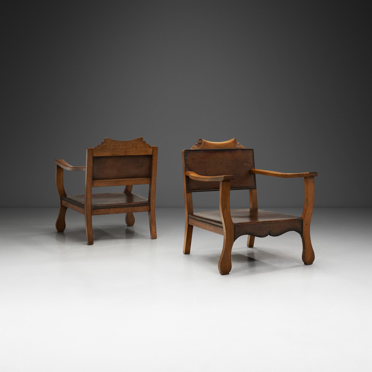 Pair of Low Beech Armchairs with Leather Seats by Otto Schulz, Sweden Mid-20th Century