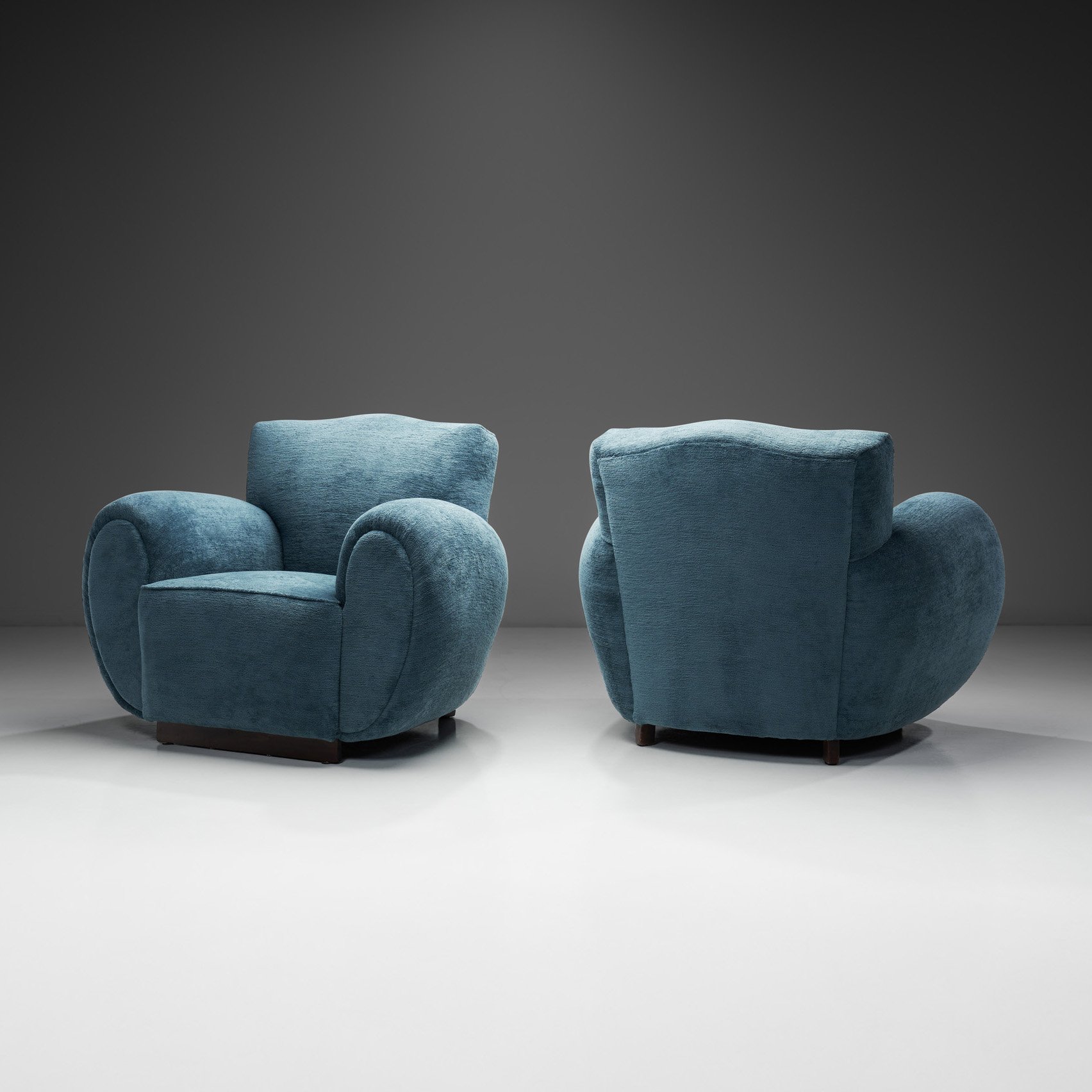 A Pair of Blue Upholstered Club Chairs, Europe 20th Century (sold)