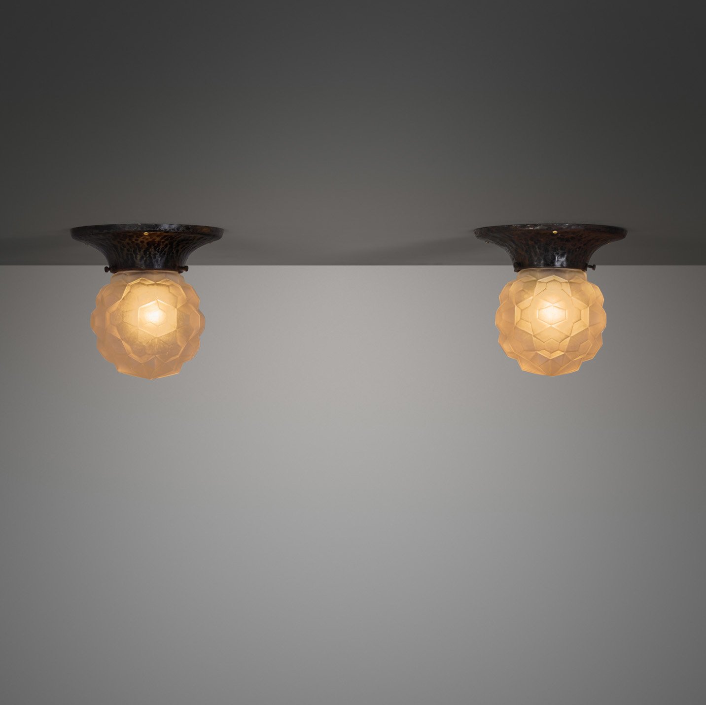 A Pair of Copper and Frosted Glass Ceiling Lamps, Europe Early 20th Century (sold)