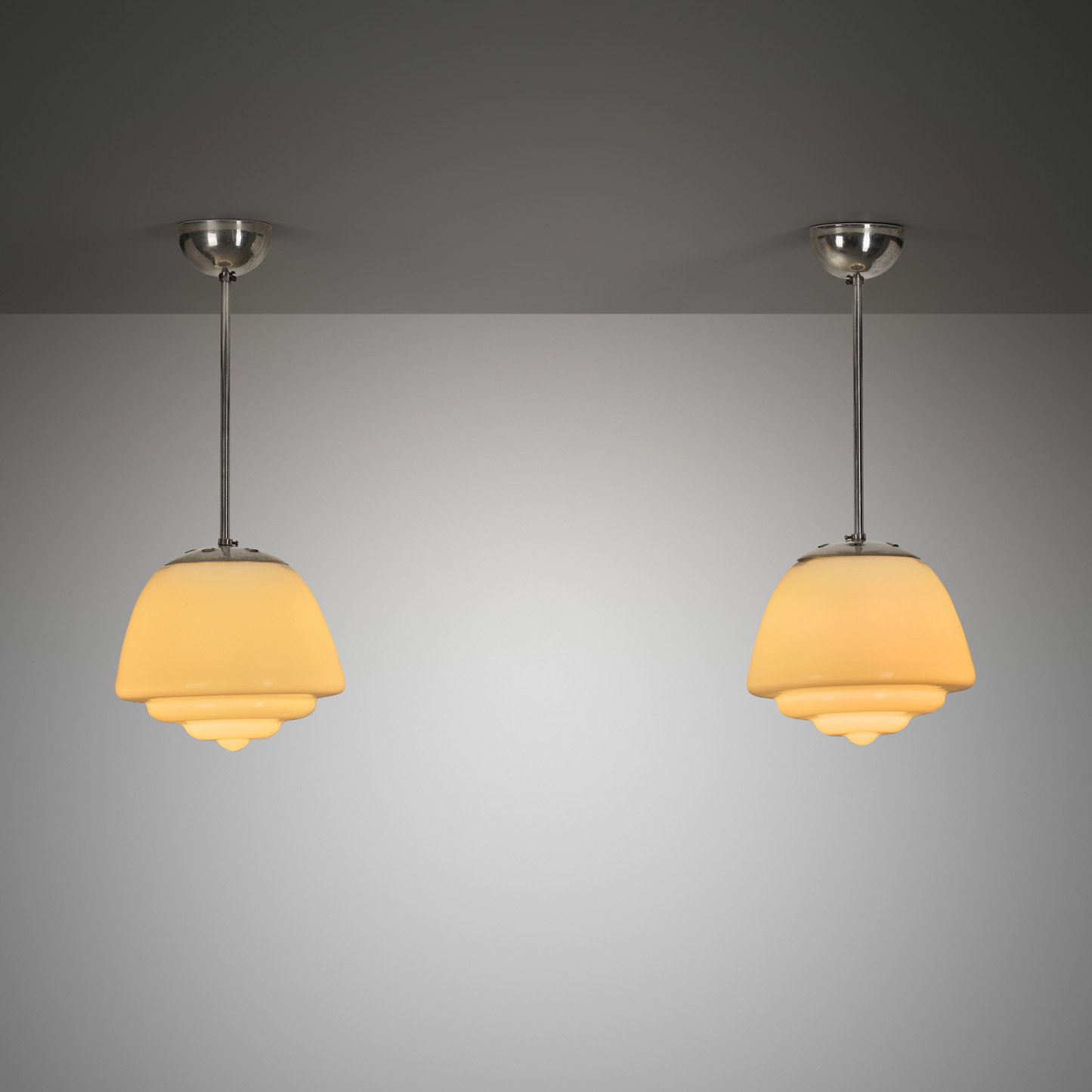 Pair of Stepped Opal Glass Pendant Lamps with Metal Frame, Europe 1940s