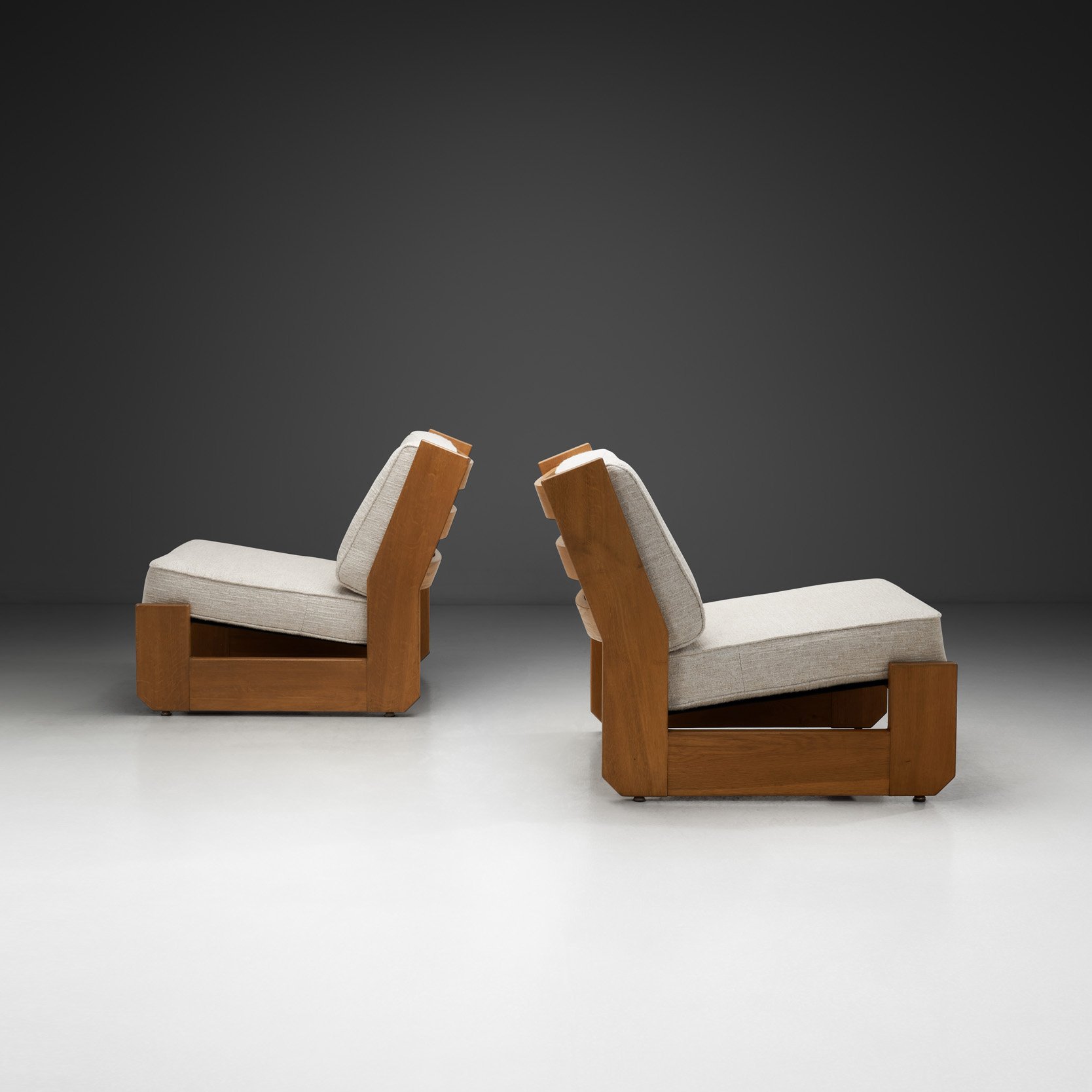 Pair of Maison Regain Lounge Chairs, France Second half of the 20th Century
