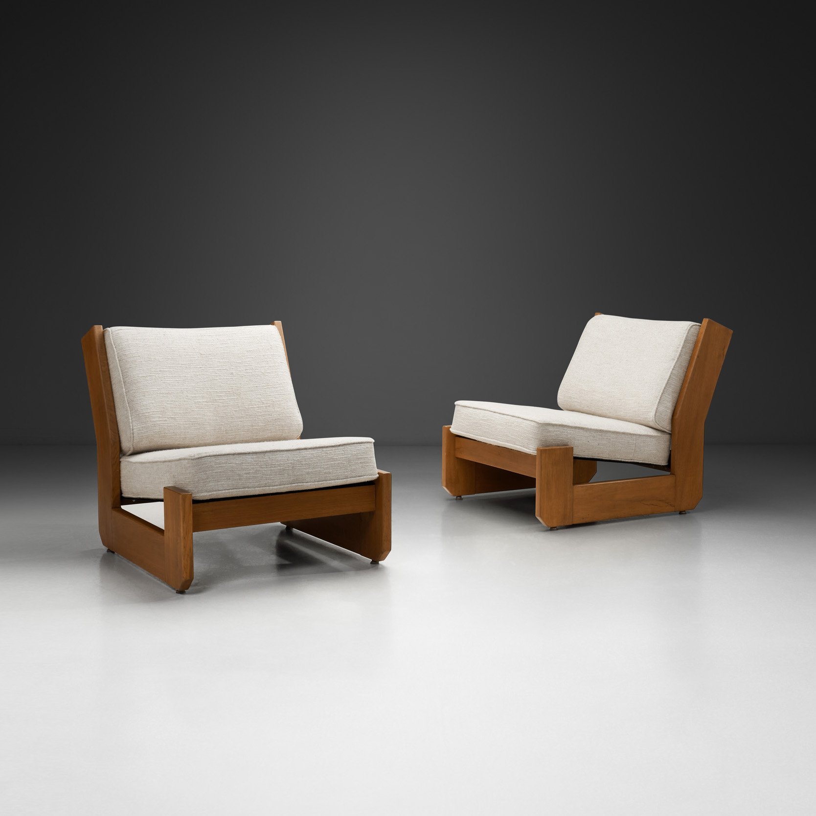 Pair of Maison Regain Lounge Chairs, France Second half of the 20th Century