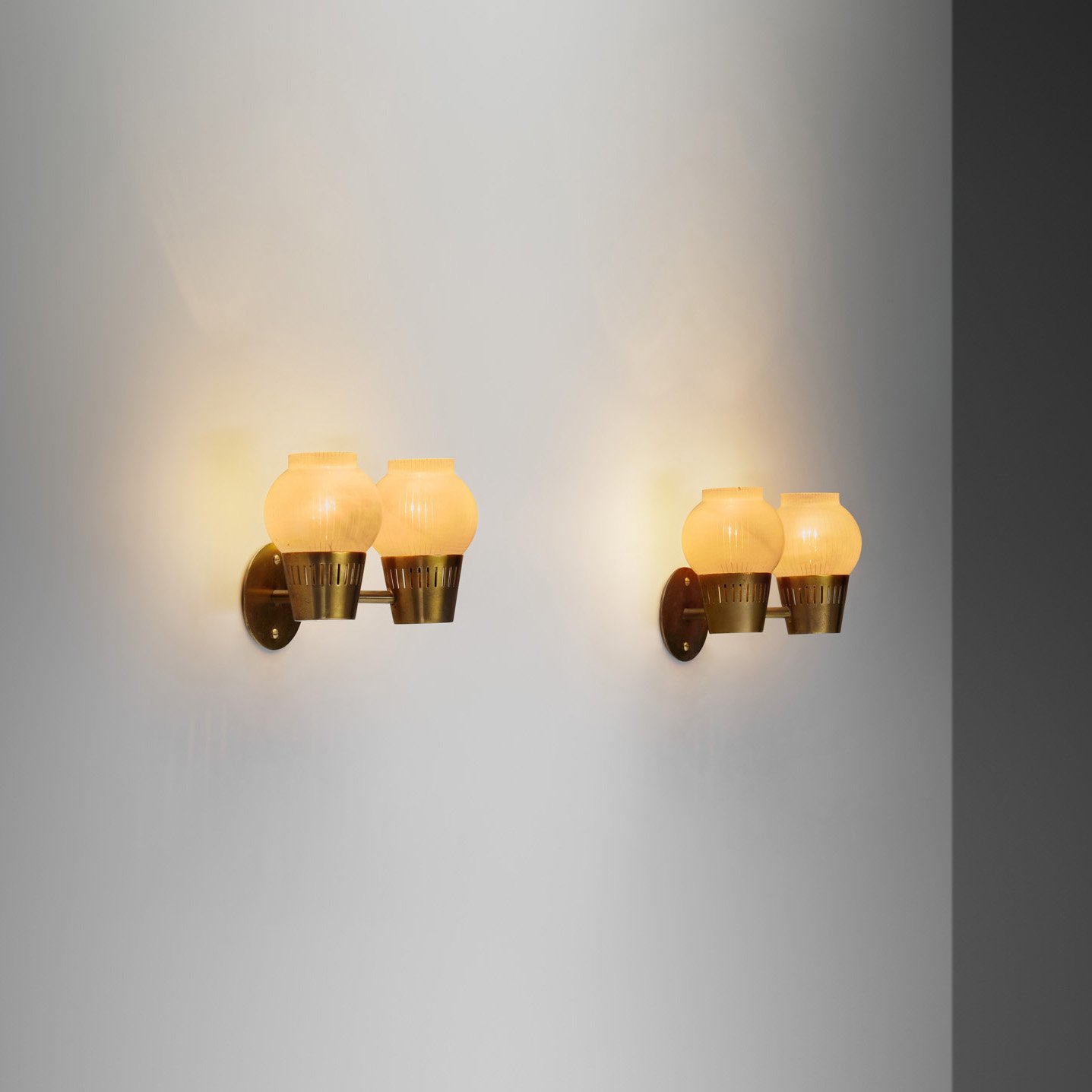A Pair of Brass and Opal Glass Wall Lamps, Scandinavia ca 1960s (sold)