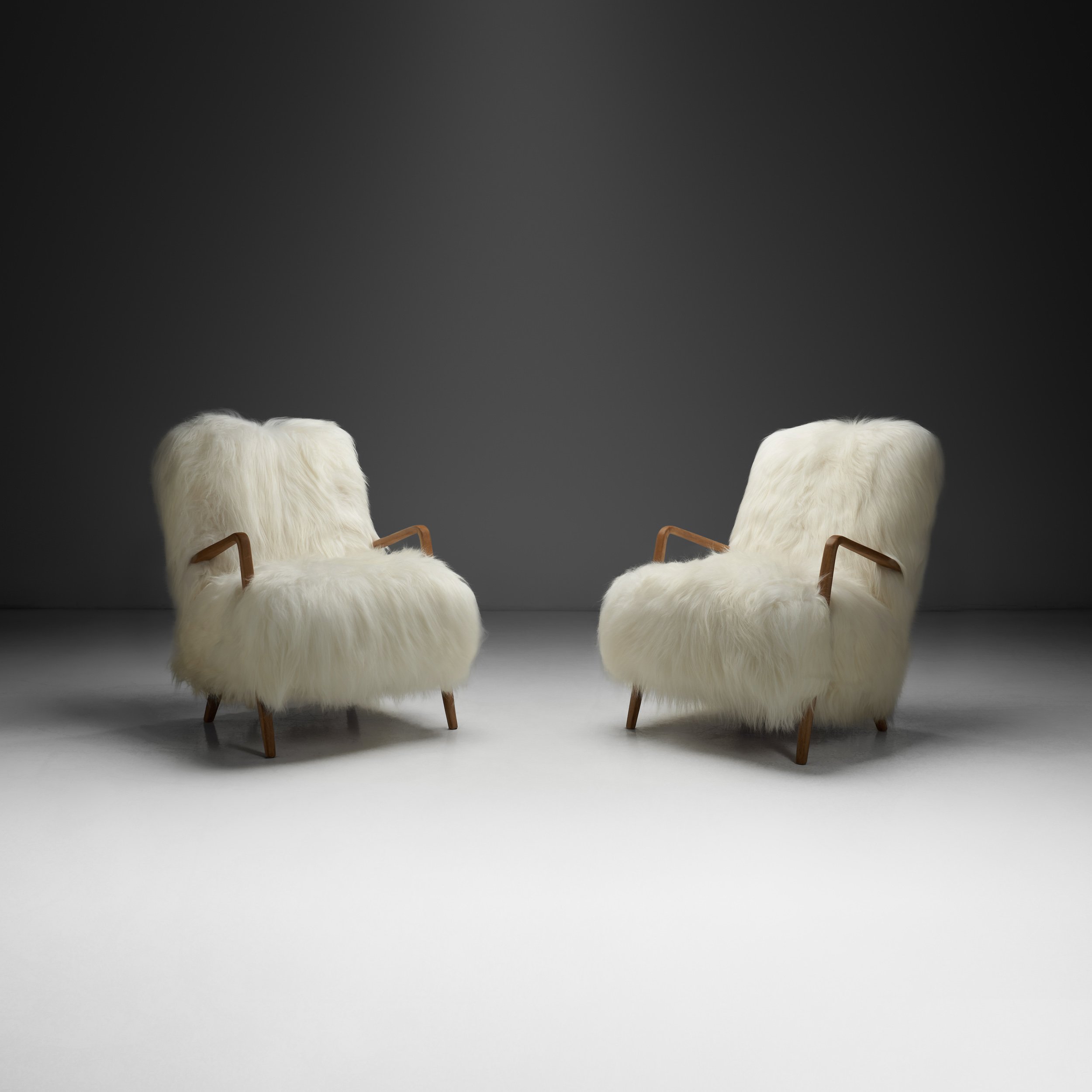 Pair of Italian Lounge Chairs Upholstered in White Longhair Sheepskin, Italy 1960s