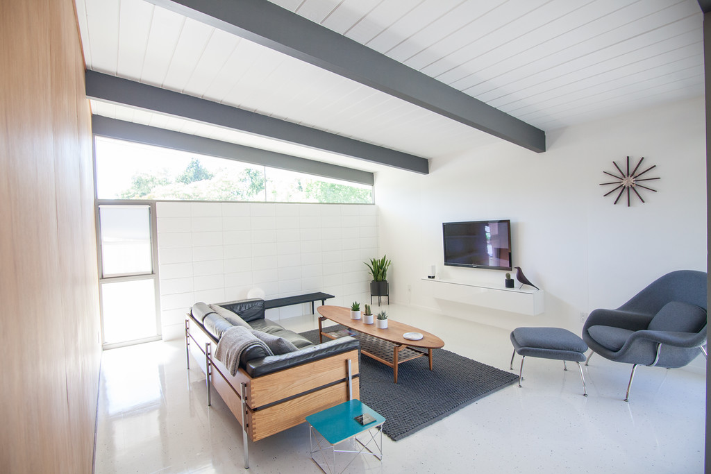 The couple's approach to their renovation has been nearly 100% DIY, similar to us, which is why naturally we get along so well ;). They installed all new VCT floors and restored their home's original paneling to its natural beauty.