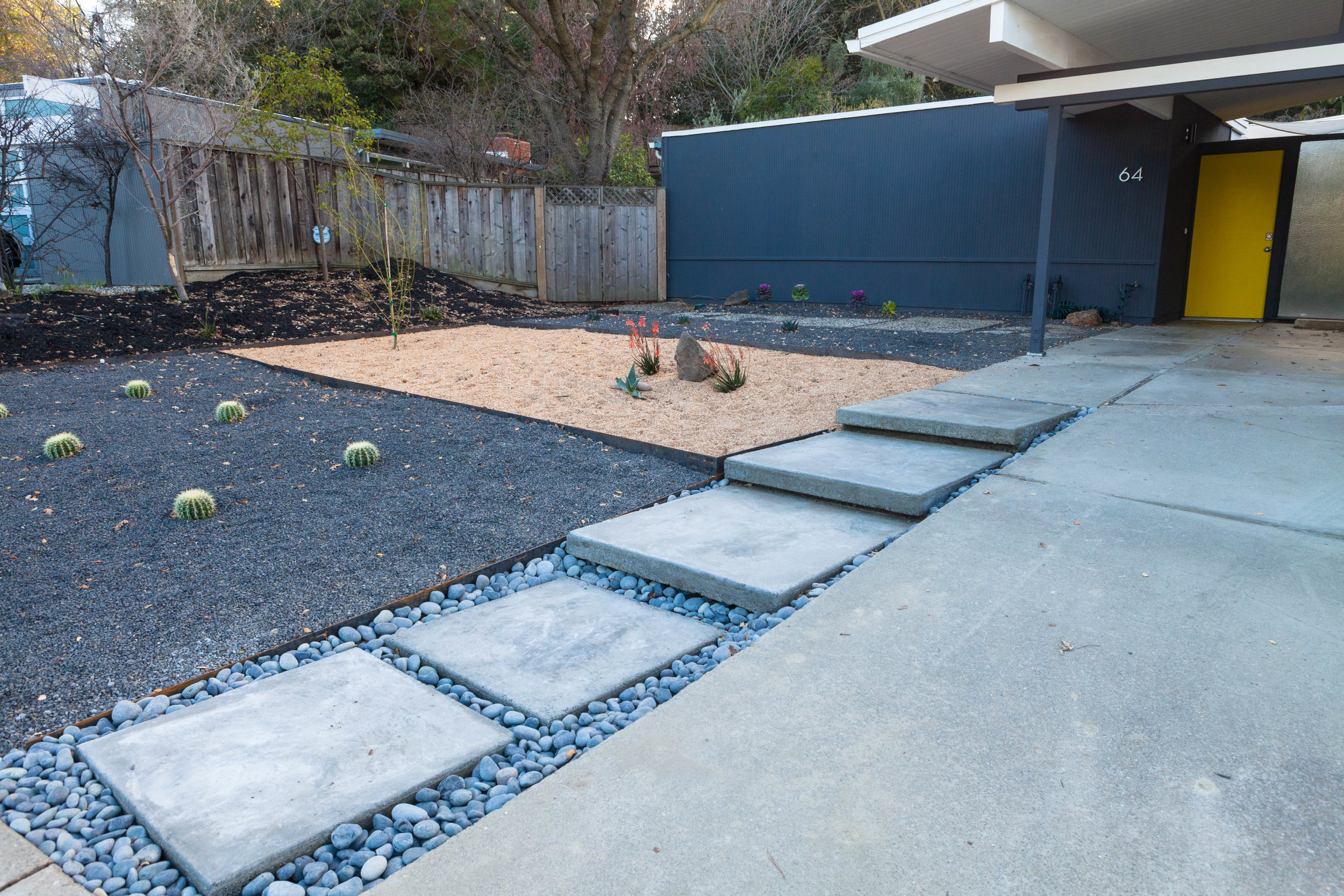 No more mowing lawns! But now we do have to rake our rock garden. 