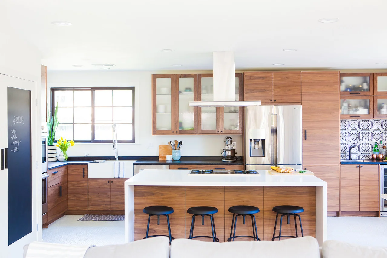 After: New Kitchen Island, Bar Area, and a more open, light-filled space.