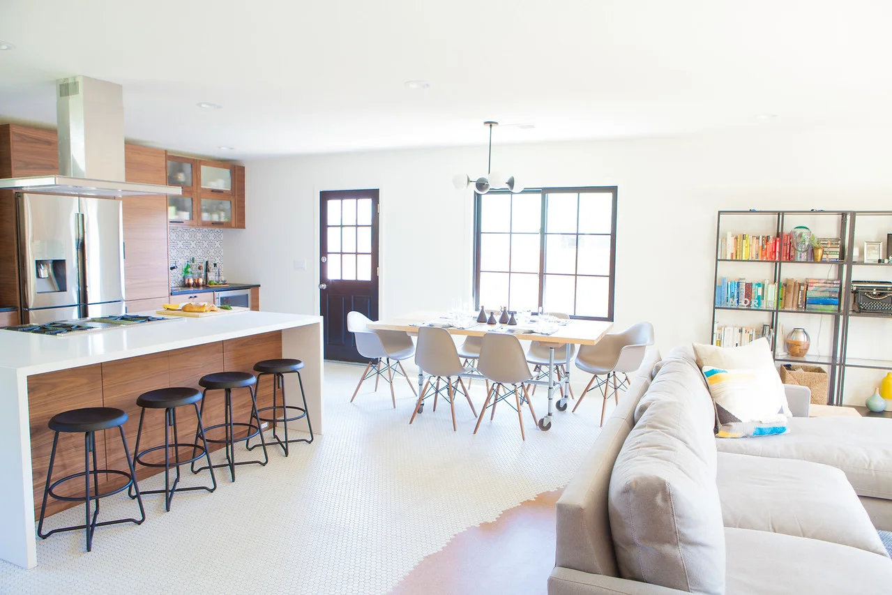 After: Open Kitchen to Living and Dining Areas, perfect for entertaining.