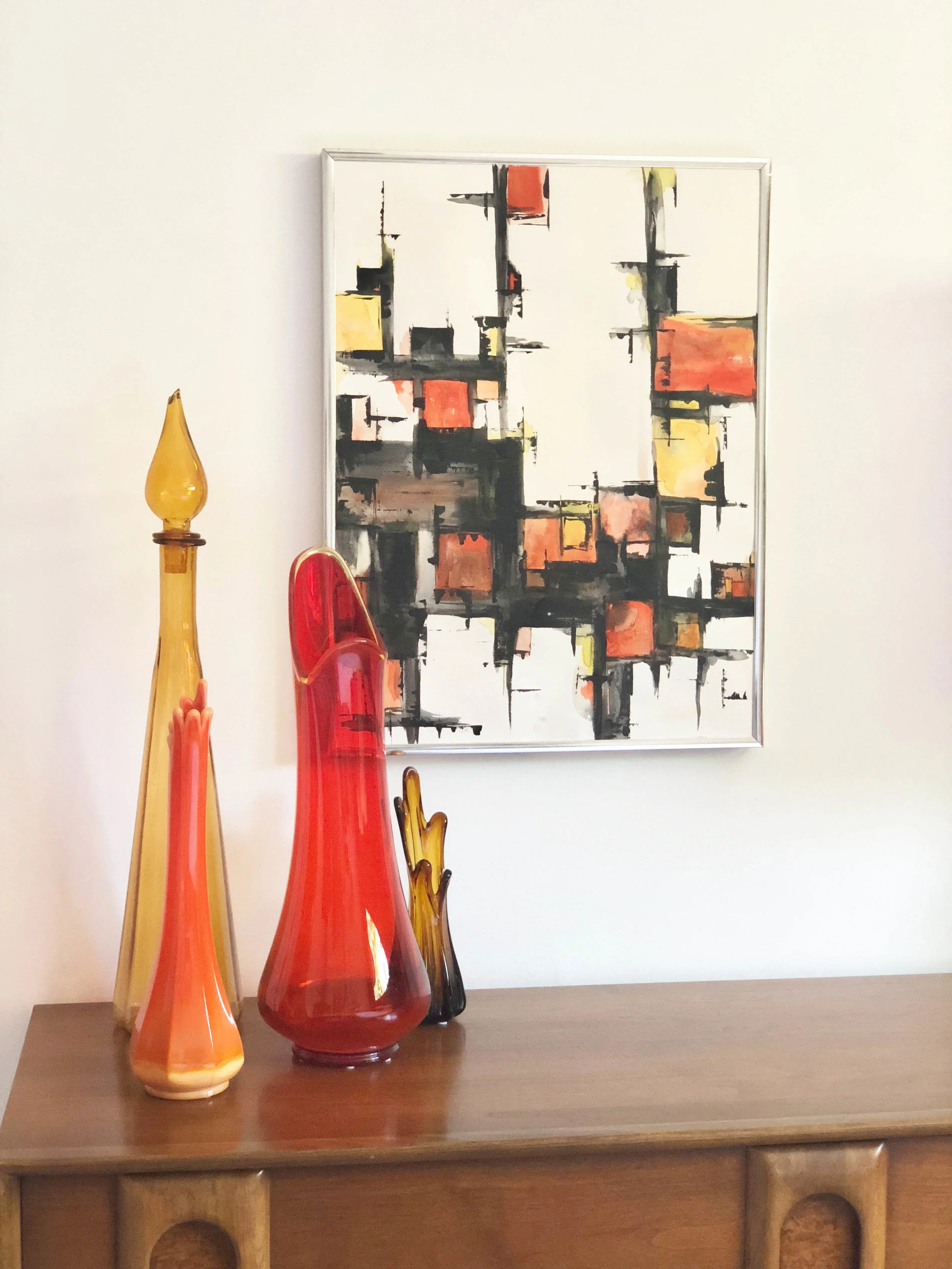 Jenny created so many vibrant paintings throughout their home .... with perfect accessories.