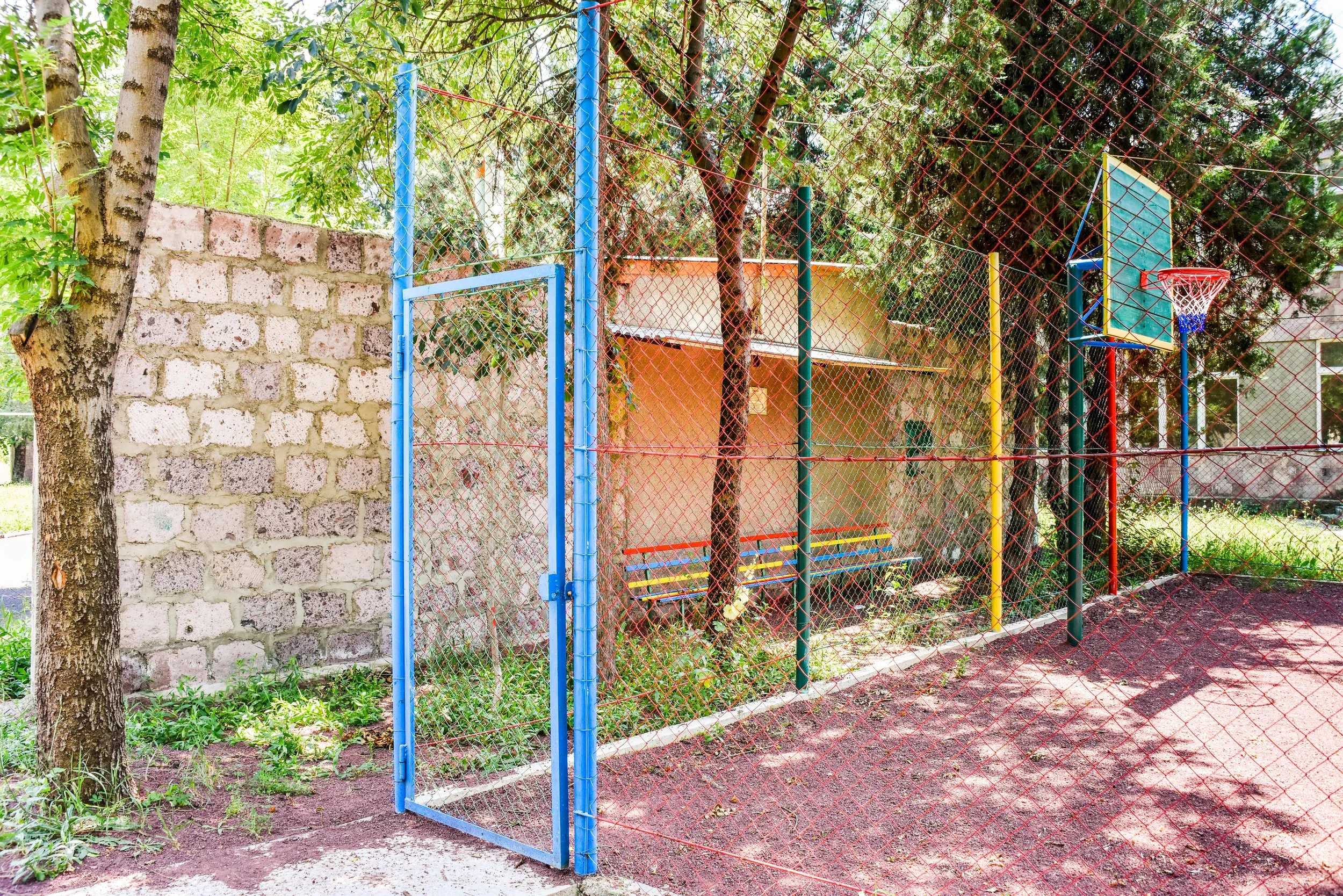 Blast wall protecting playground