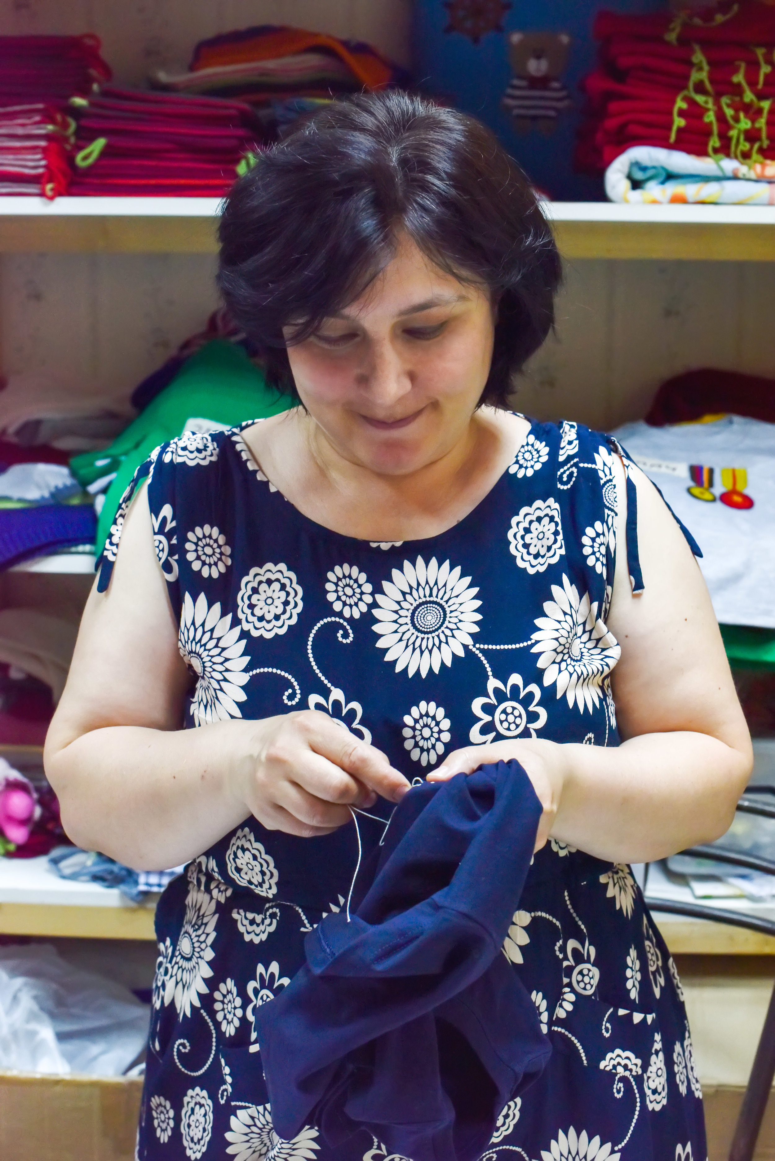 Skilled workers produce the beautifully detailed clothes by hand