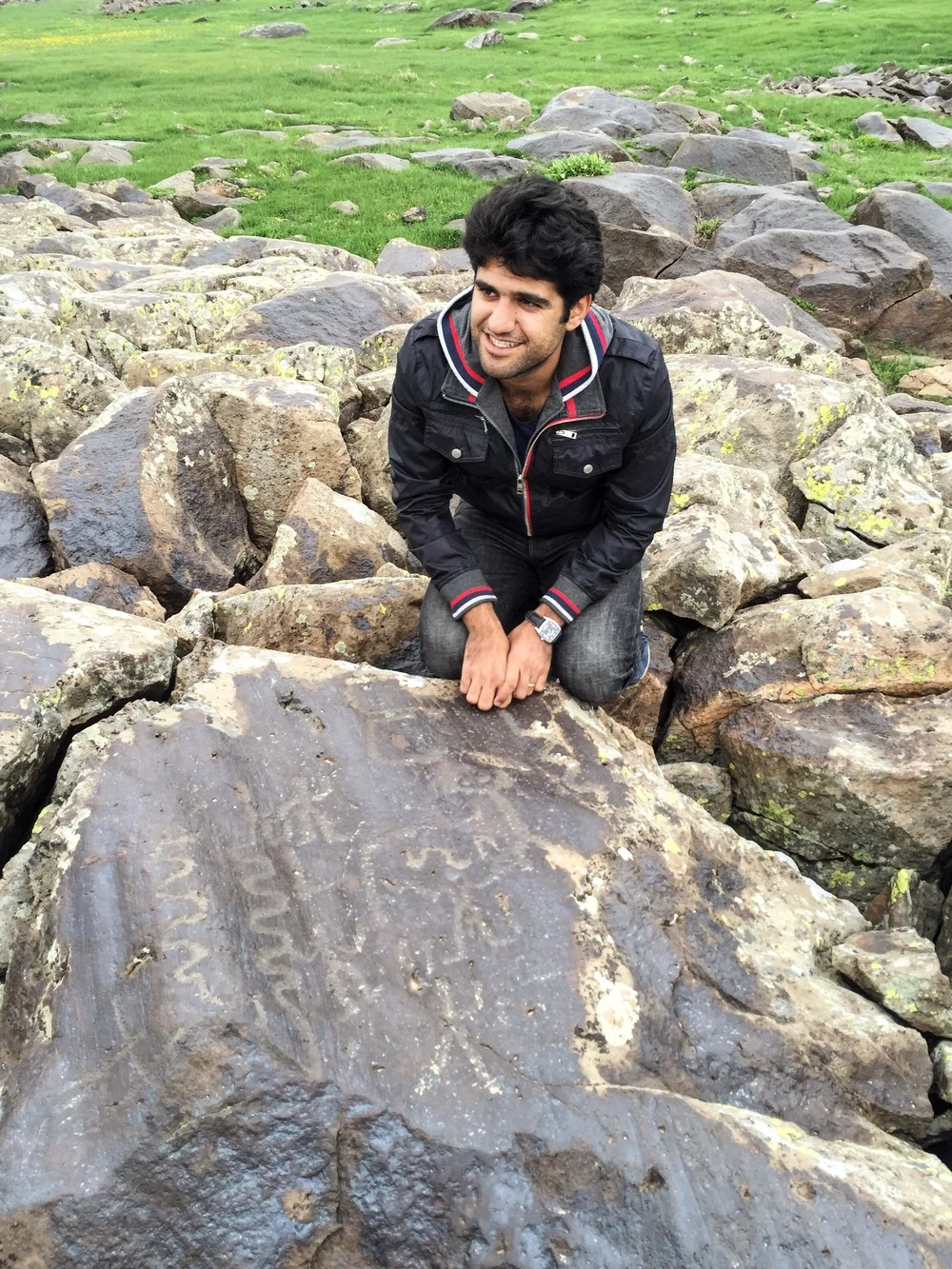 Hayk (our guide, translator, and dear friend) at the petroglyphs