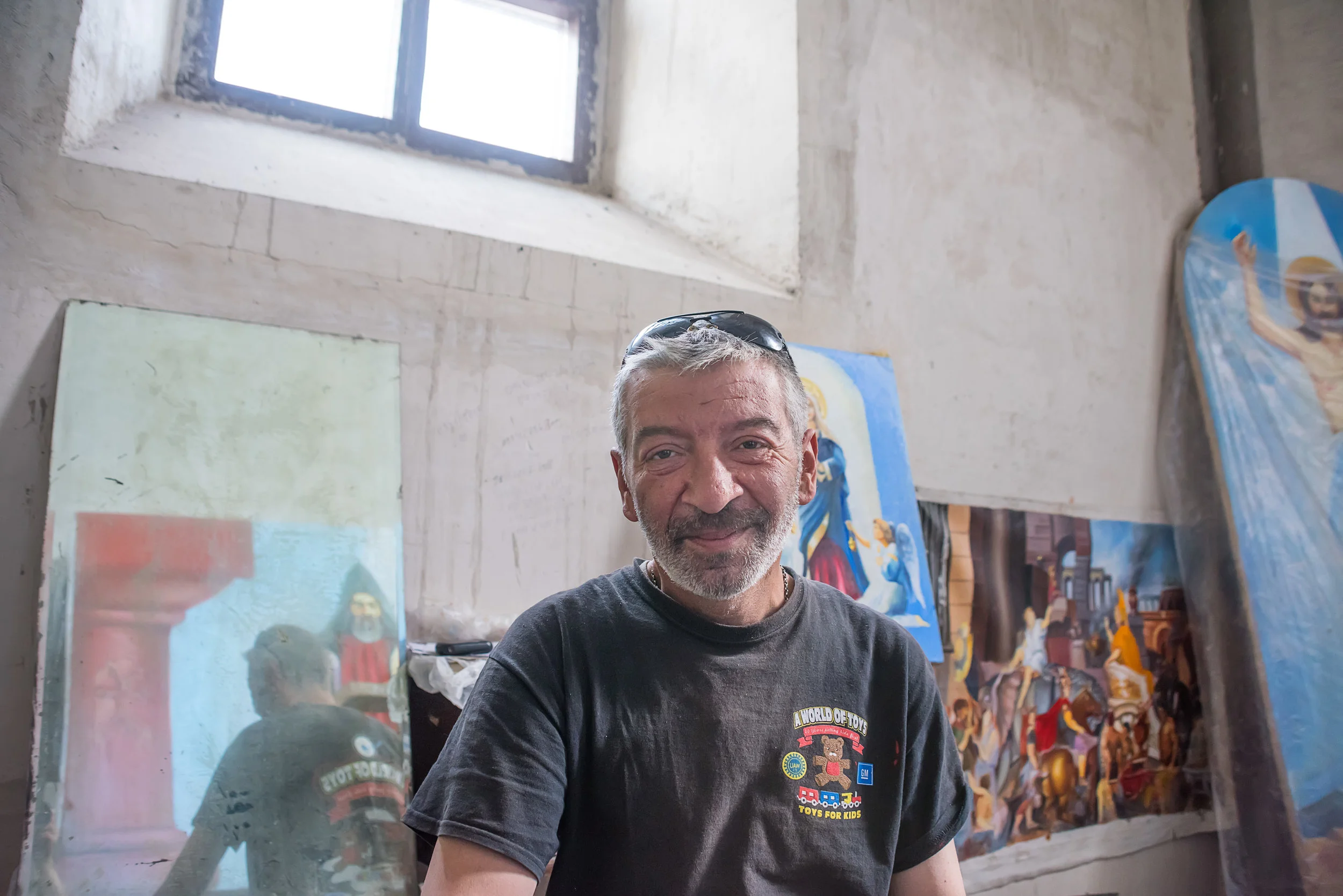 Tigran, the painter whose work will grace the cathedral interior, in his studio