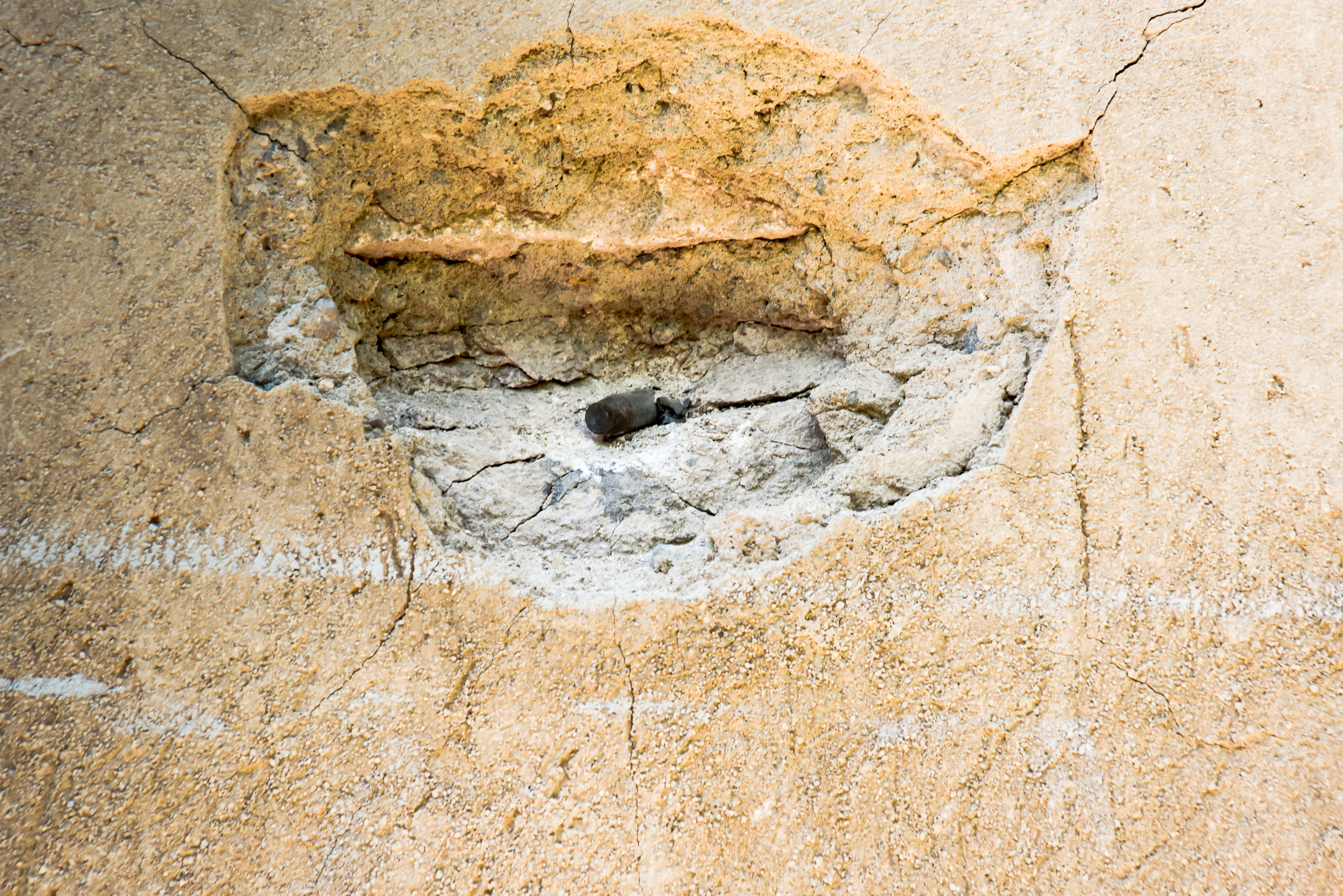 One of the bullets lodged in the walls of a home in Aygepar, which have made the entire second floor unusable.