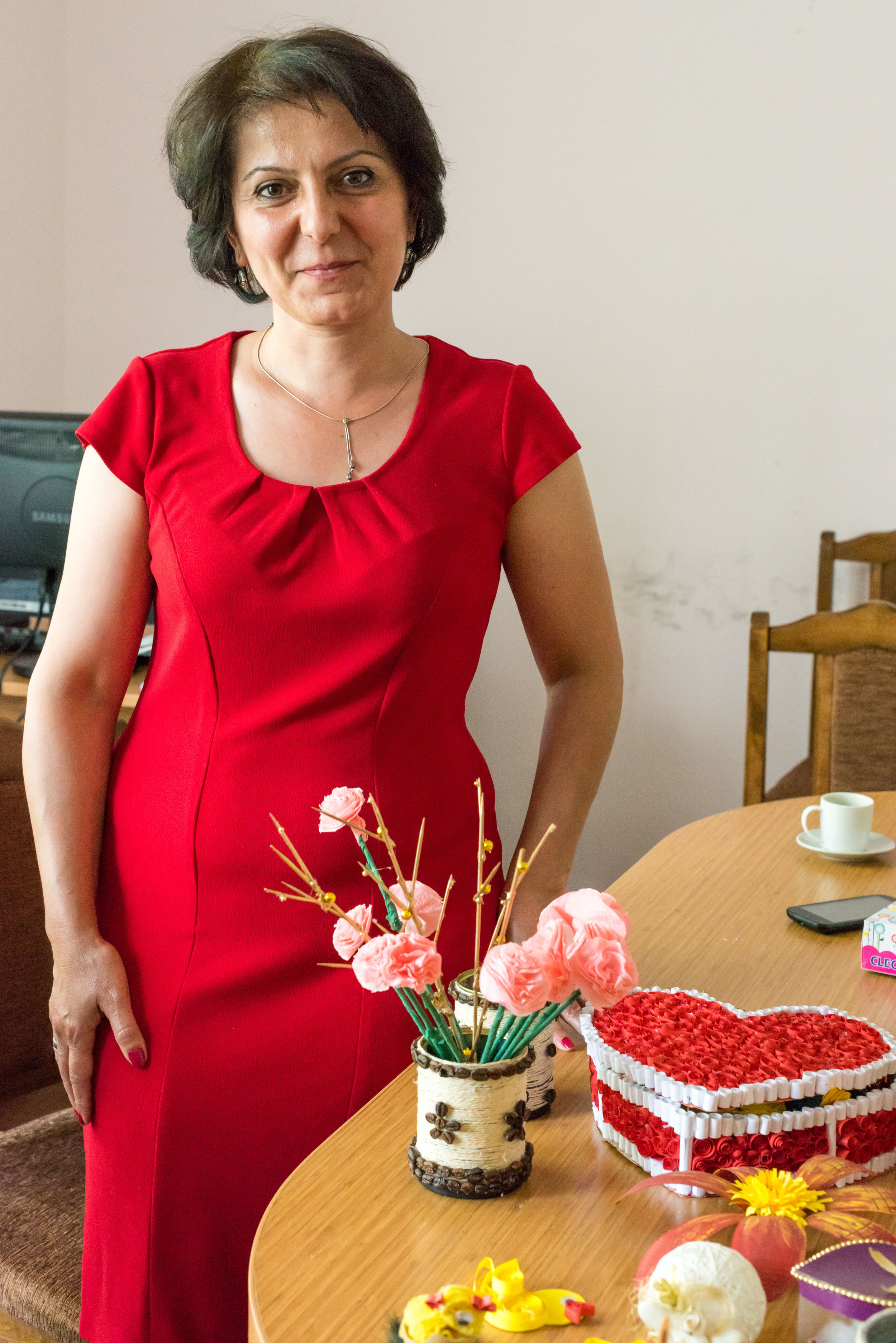 Berd art therapist Gohar with some of the projects children have made from recycled materials.