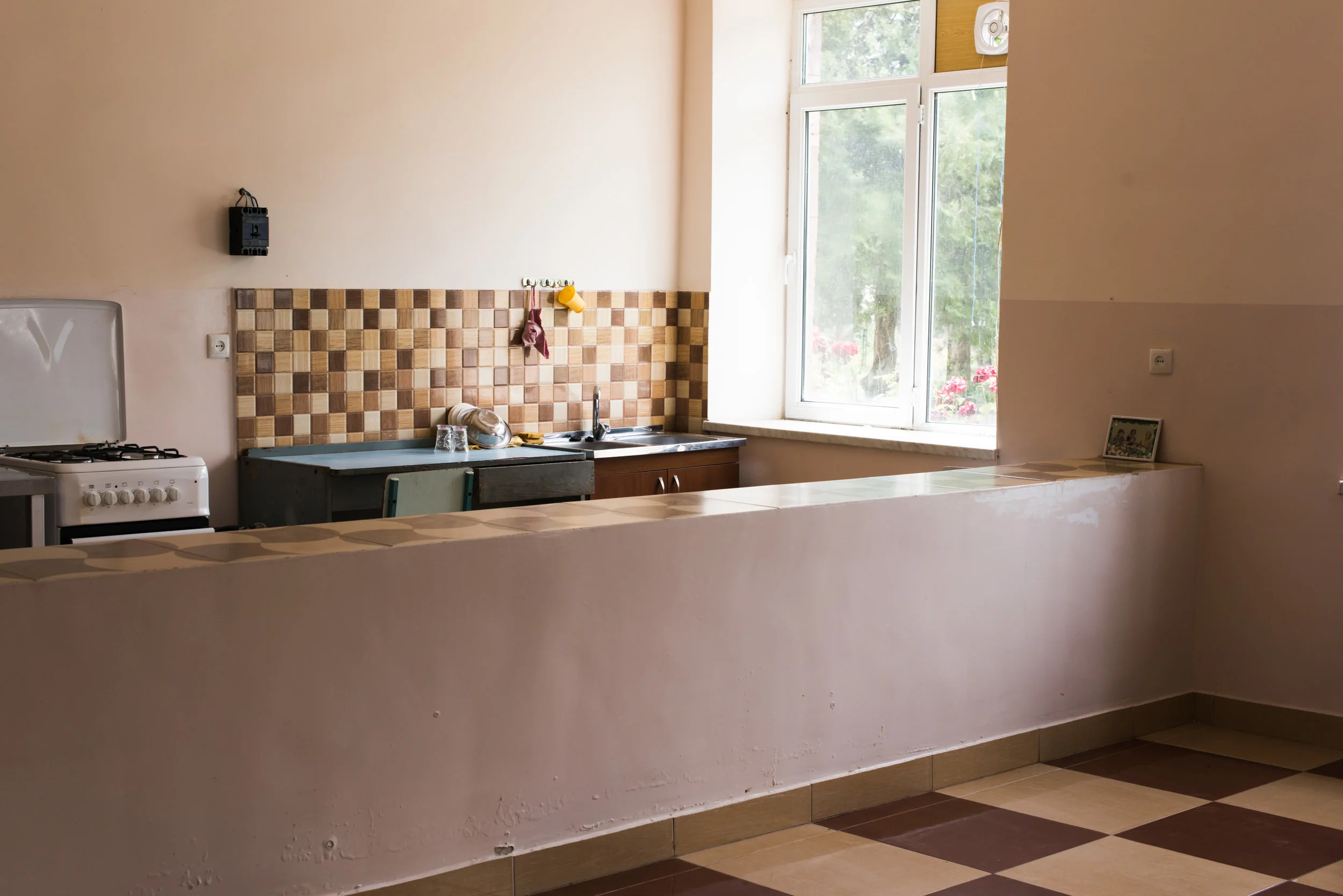 FAR restored the kitchen in Choratan's elementary school, where children can now enjoy nutritious meals.