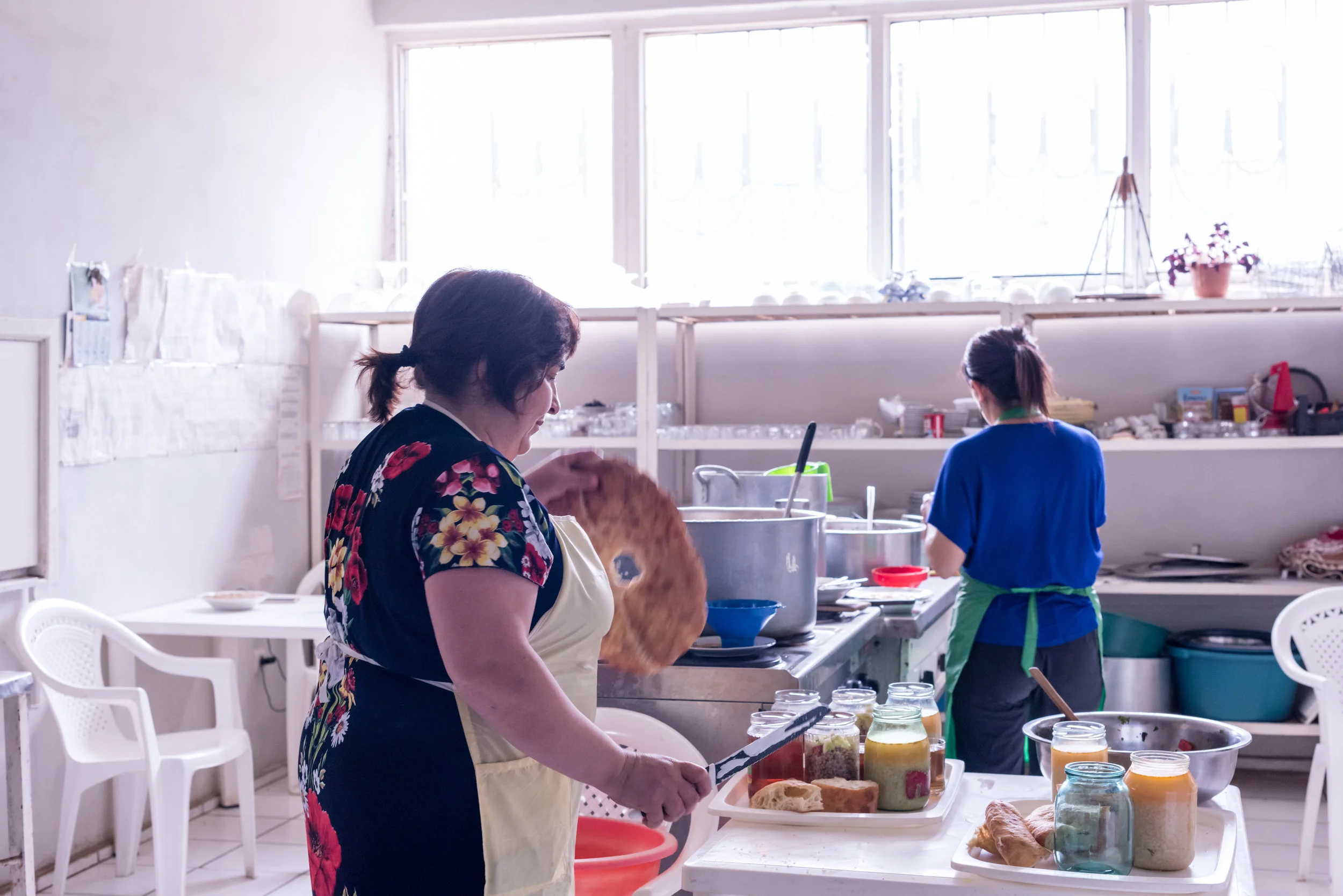 Cooks prepare nutritious meals for clients in FAR's soup kitchen.