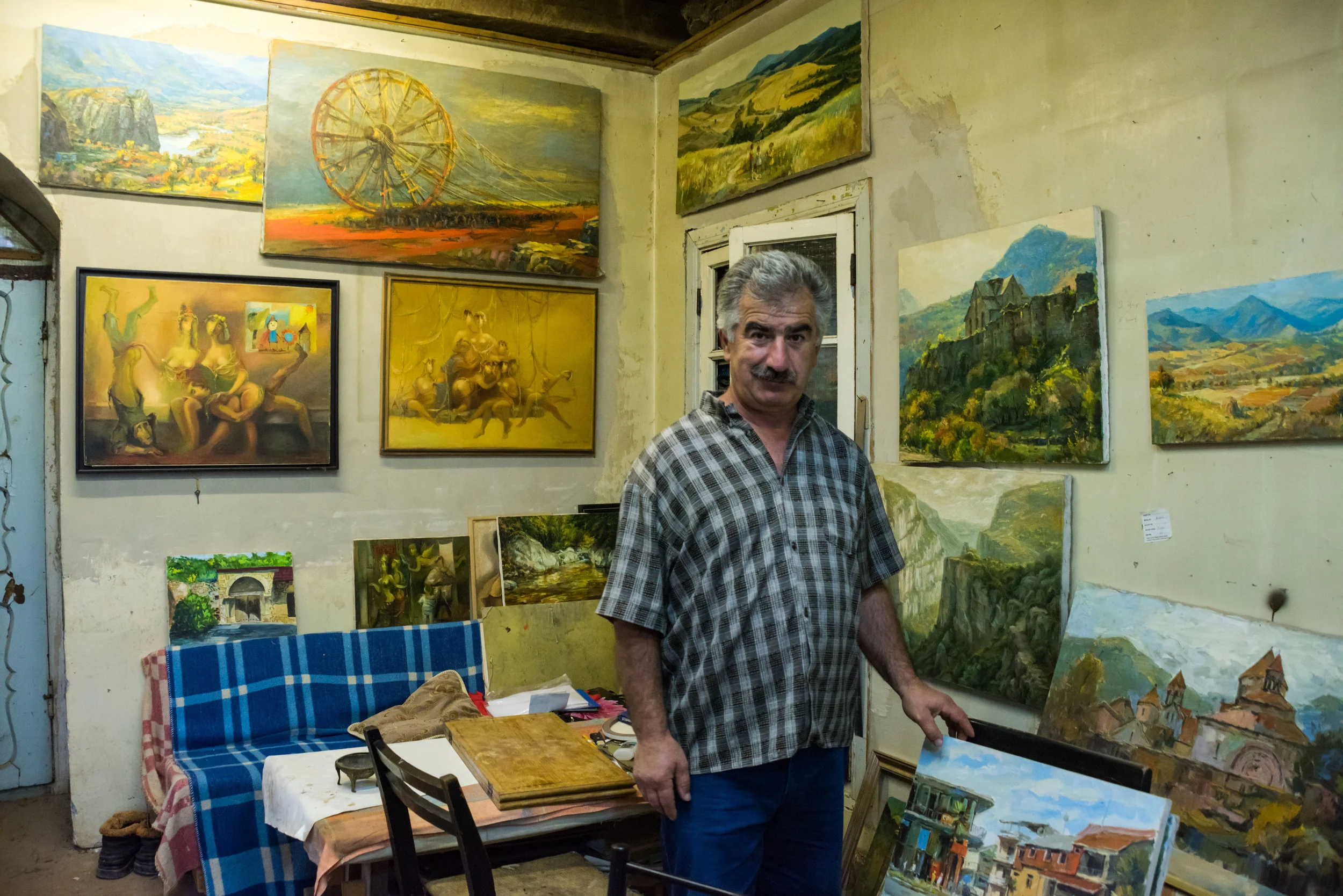 Painter Hovik Gasparyan in his Shushi studio. His landscapes capture the soul of the Armenian lands, while his modernist work is rich with social and political commentary.
