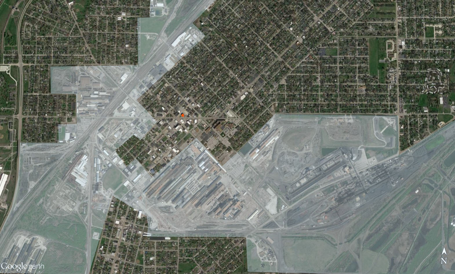 The red dot is City Hall Located downtown Granite City. The white out area is industrial activity