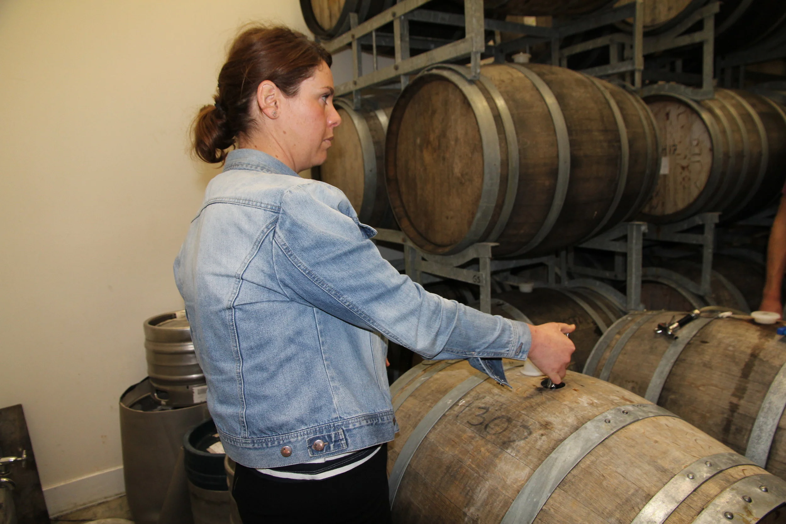 Preparing a barrel tasting.