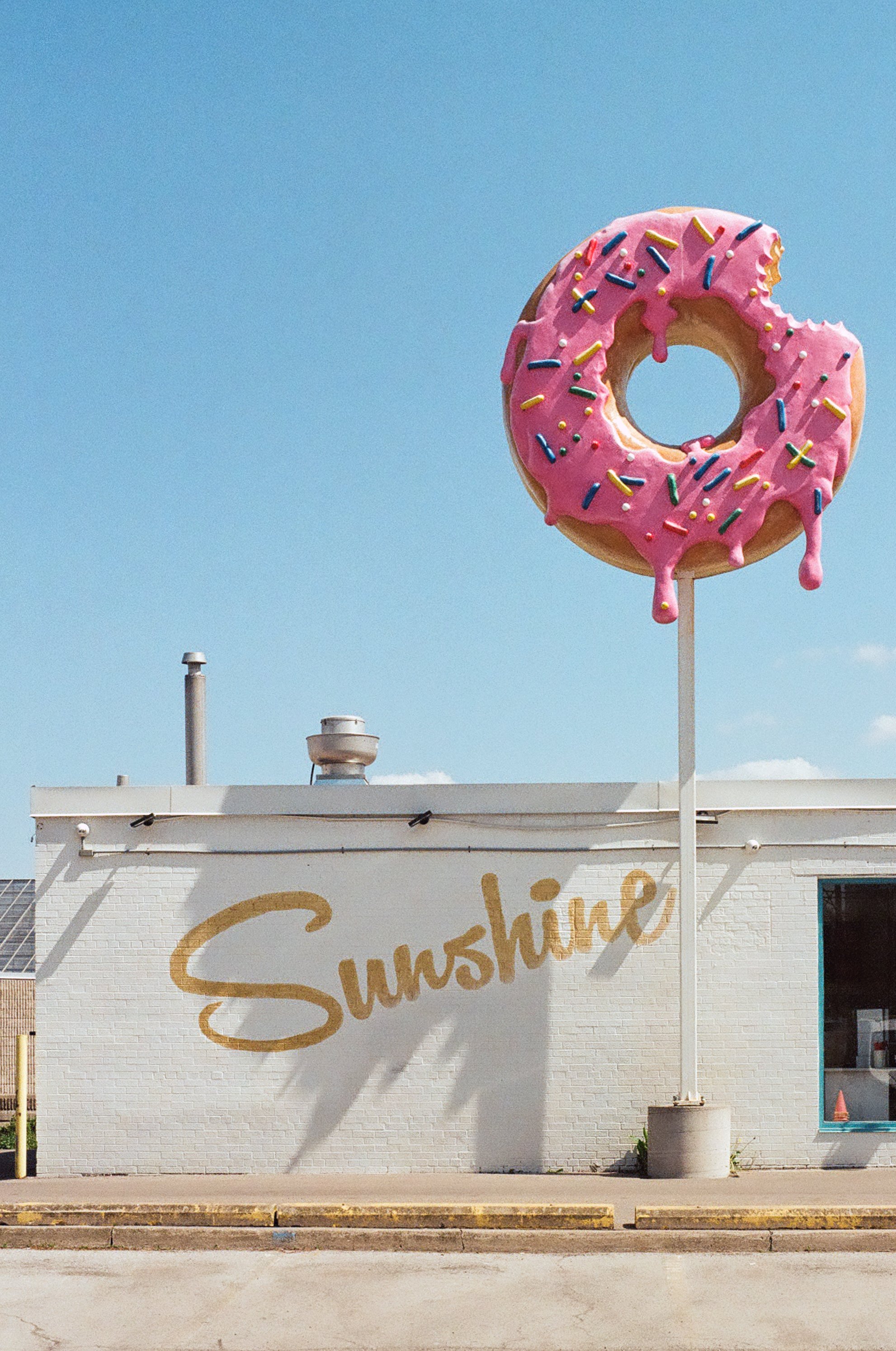  Doughnut shop under the midday sun in Ontario, Canada 