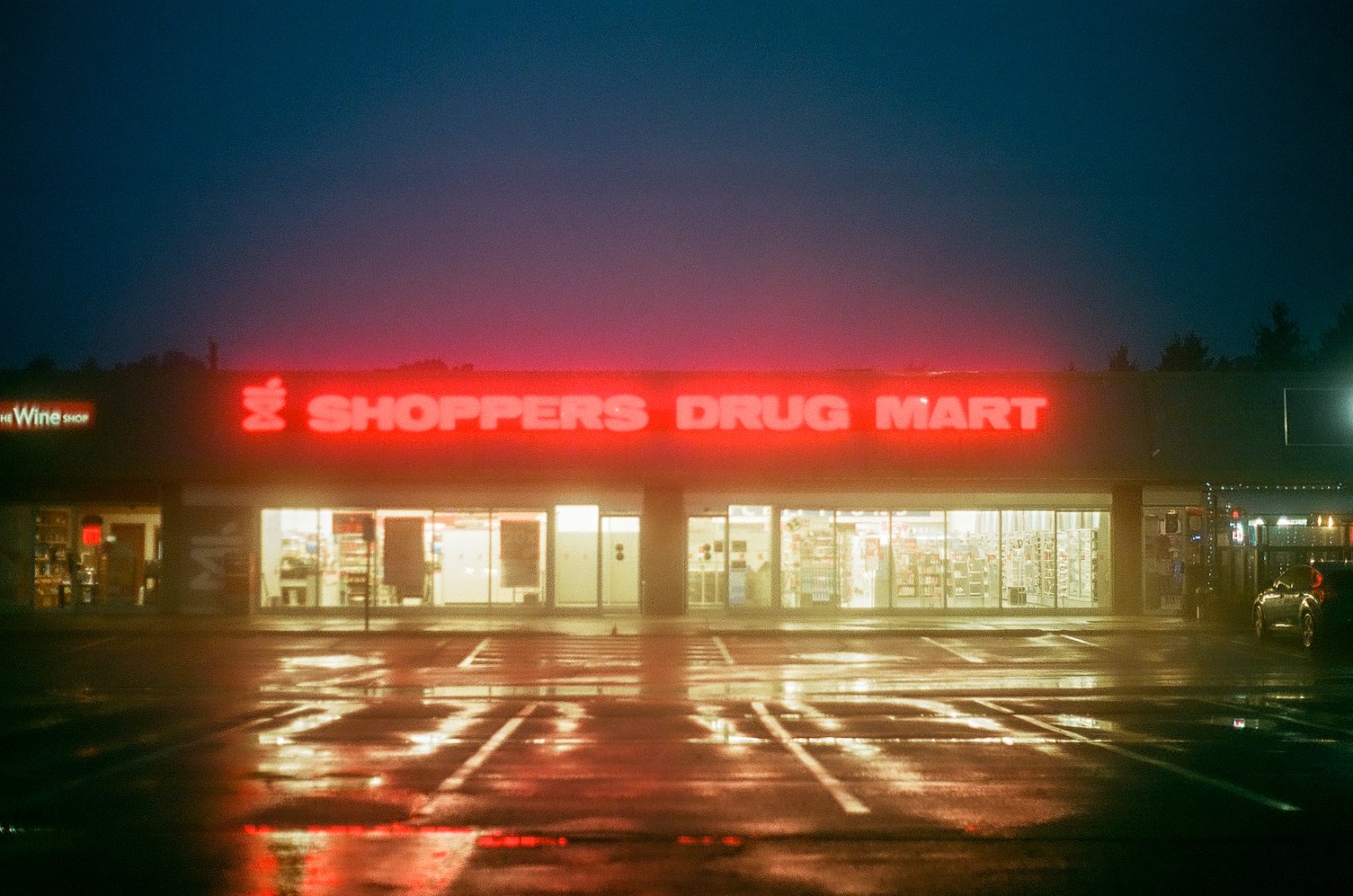  Neon storefront sign in Ontario, Canada 