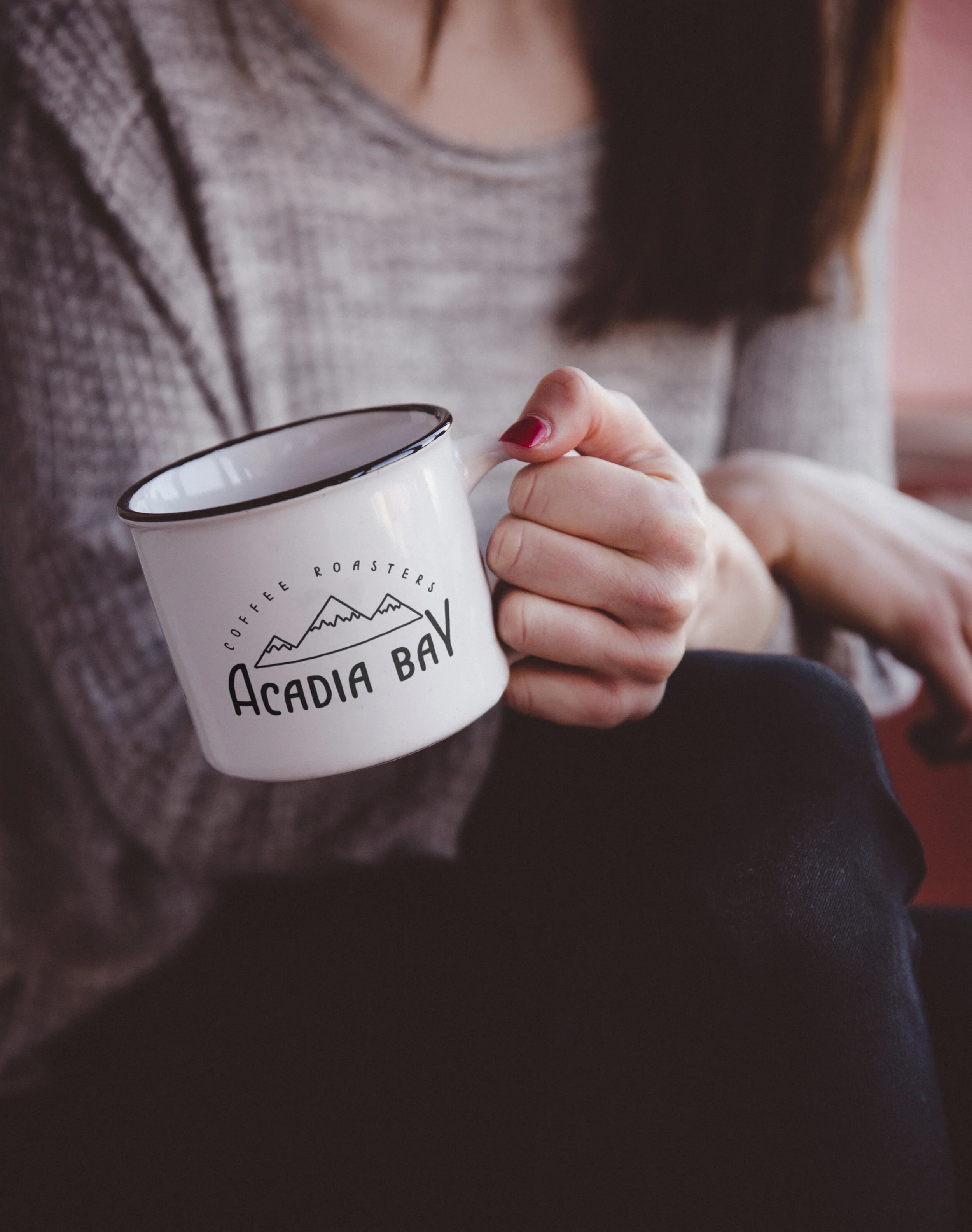 Hand Holding Metal Mug.jpg