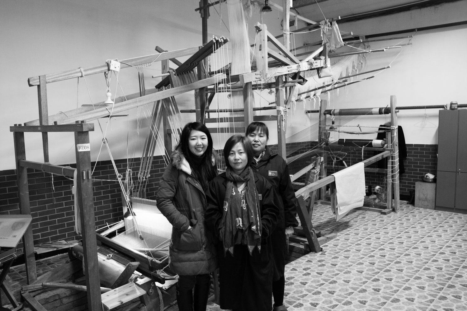 Farewell photos various weaving artisans in from of their looms.