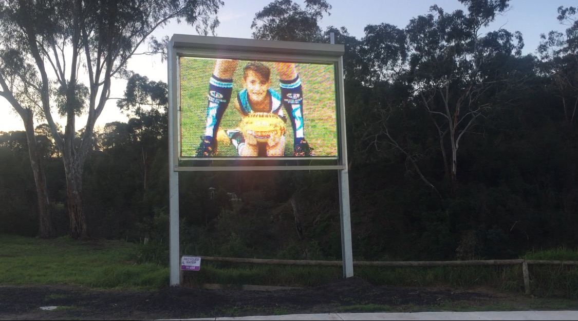 My son Taj on the new scoreboard at the St Mary's Junior Football Club celebrating Indigenous Round at a local level. 