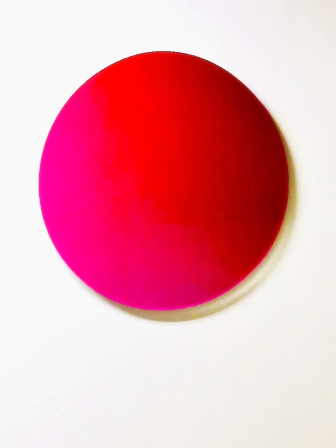 ONE REALITY is a luminous gateway&mdash;reduced to a single circle that encompasses everything. The neon pink surface reflects the outside world and at the same time invites us to look inward. Perception becomes a question: Where does the self end an