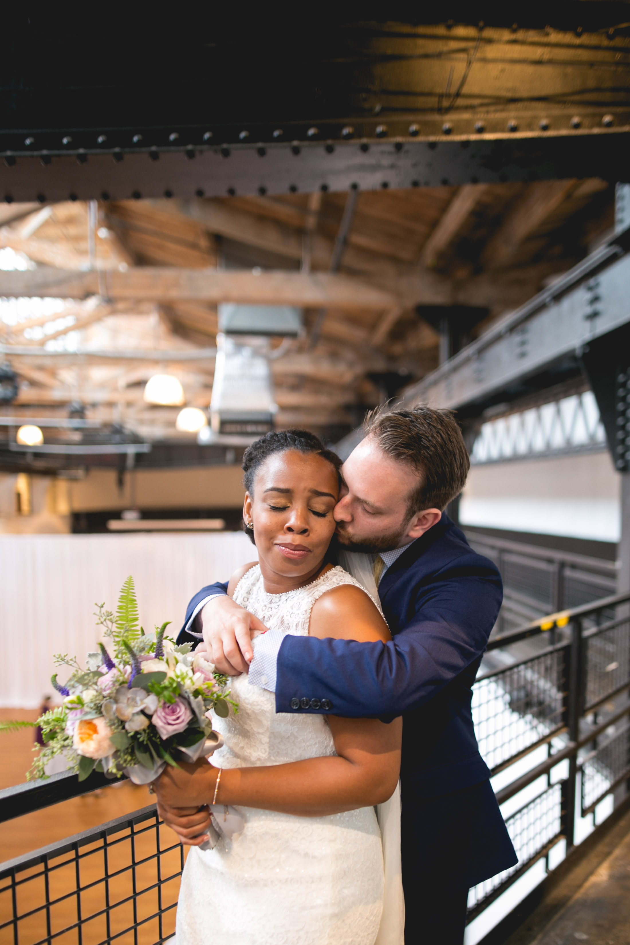 A Philadelphia Fishtown Skybox Wedding by Lesbian Photographer Swiger Photographer. Monet and Daniel - an industrial fall Philly Wedding