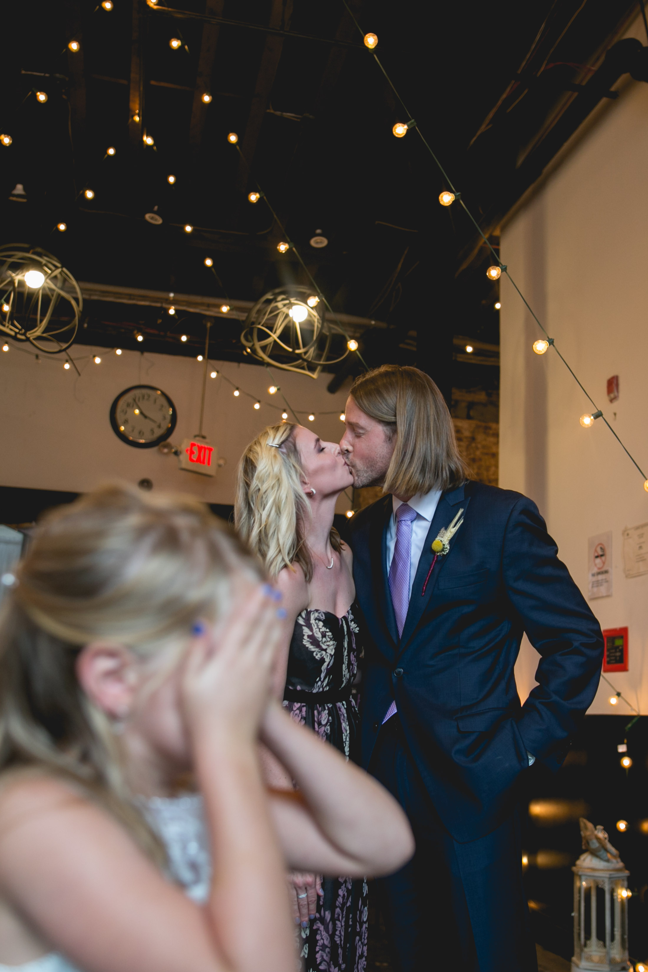 A Philadelphia Fishtown Skybox Wedding by Lesbian Photographer Swiger Photographer. Monet and Daniel - an industrial fall Philly Wedding