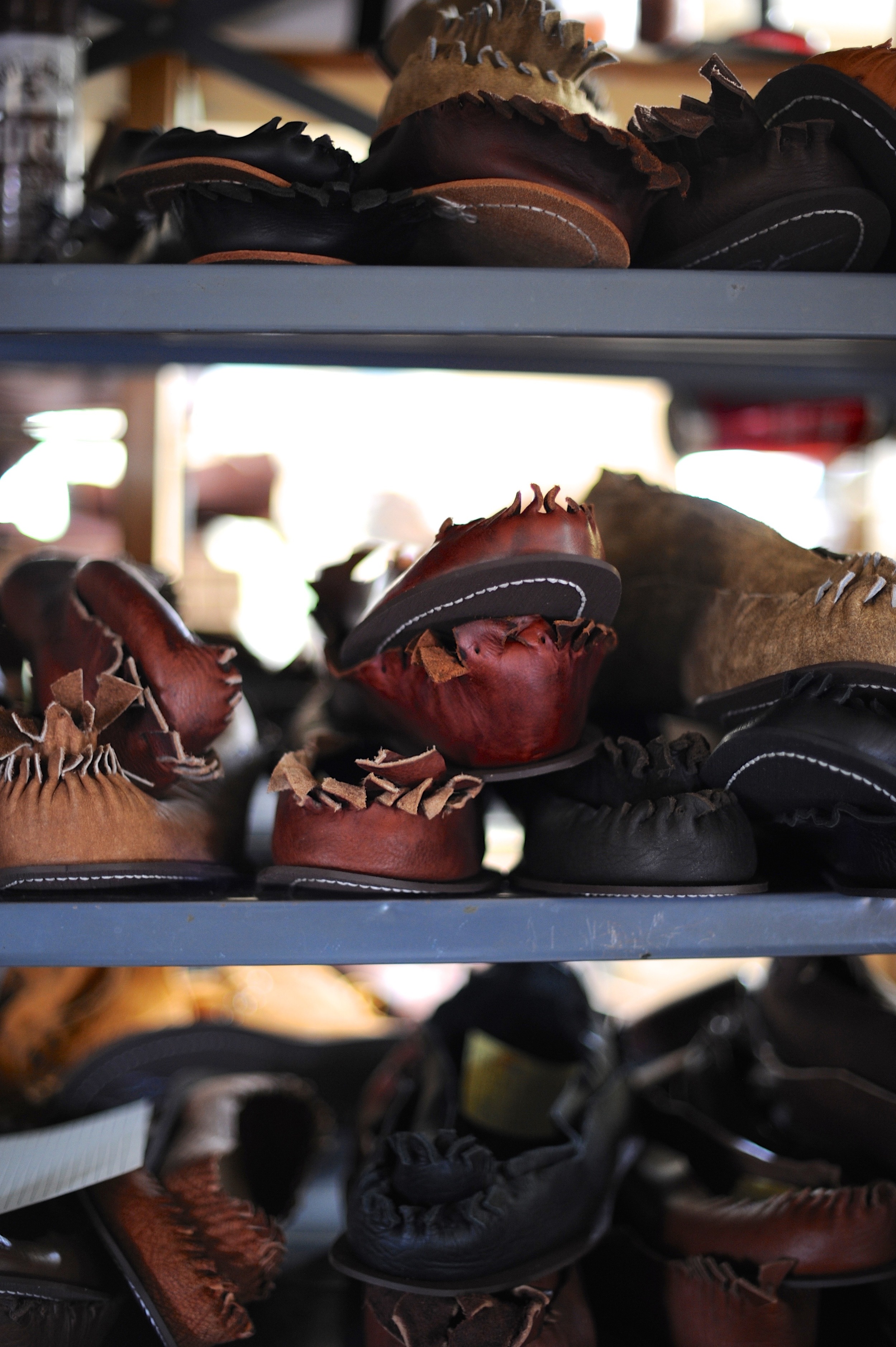 stacks of leather shoes