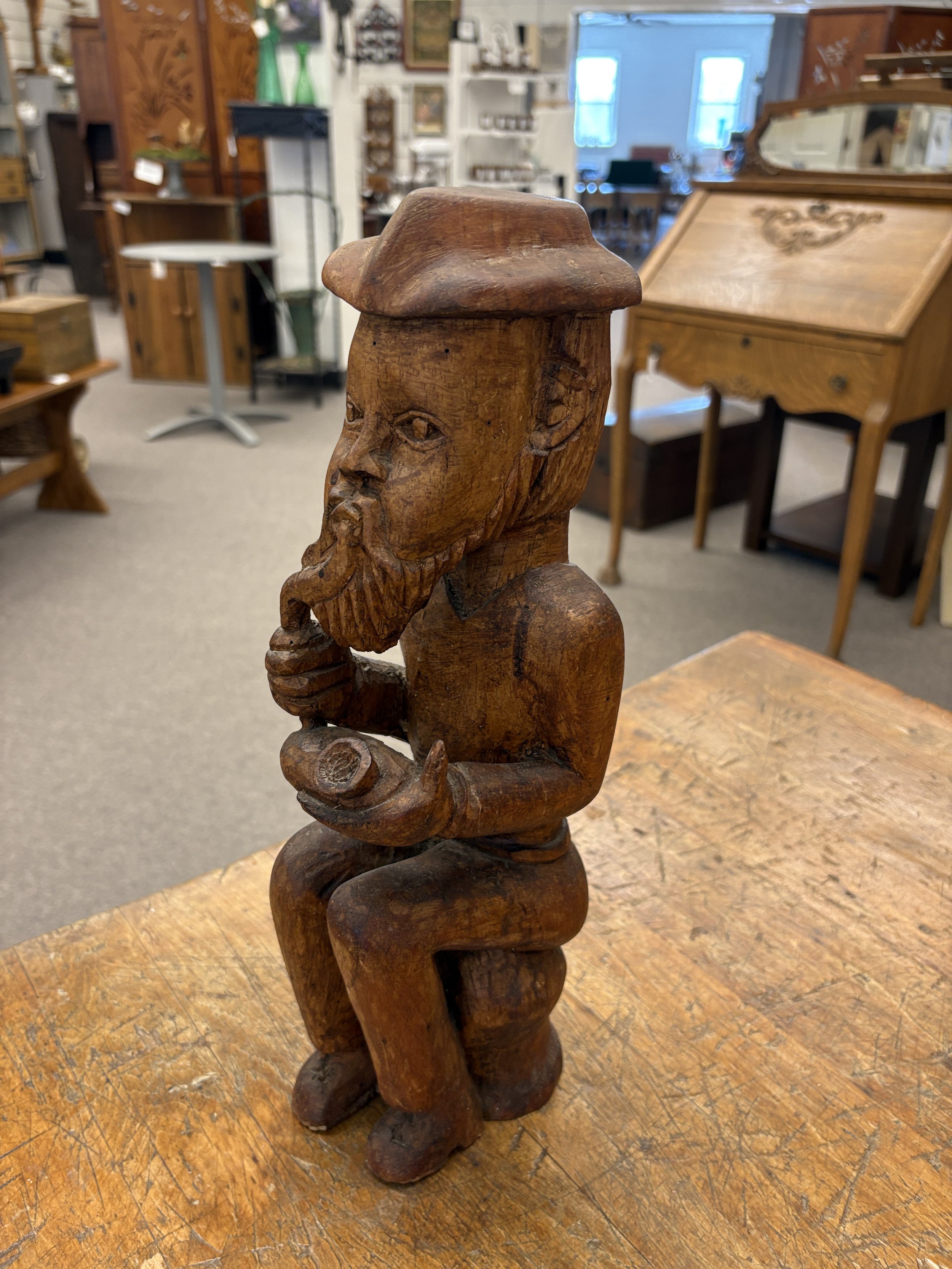 Handcrafted Pipe-Smoking Man Sculpture