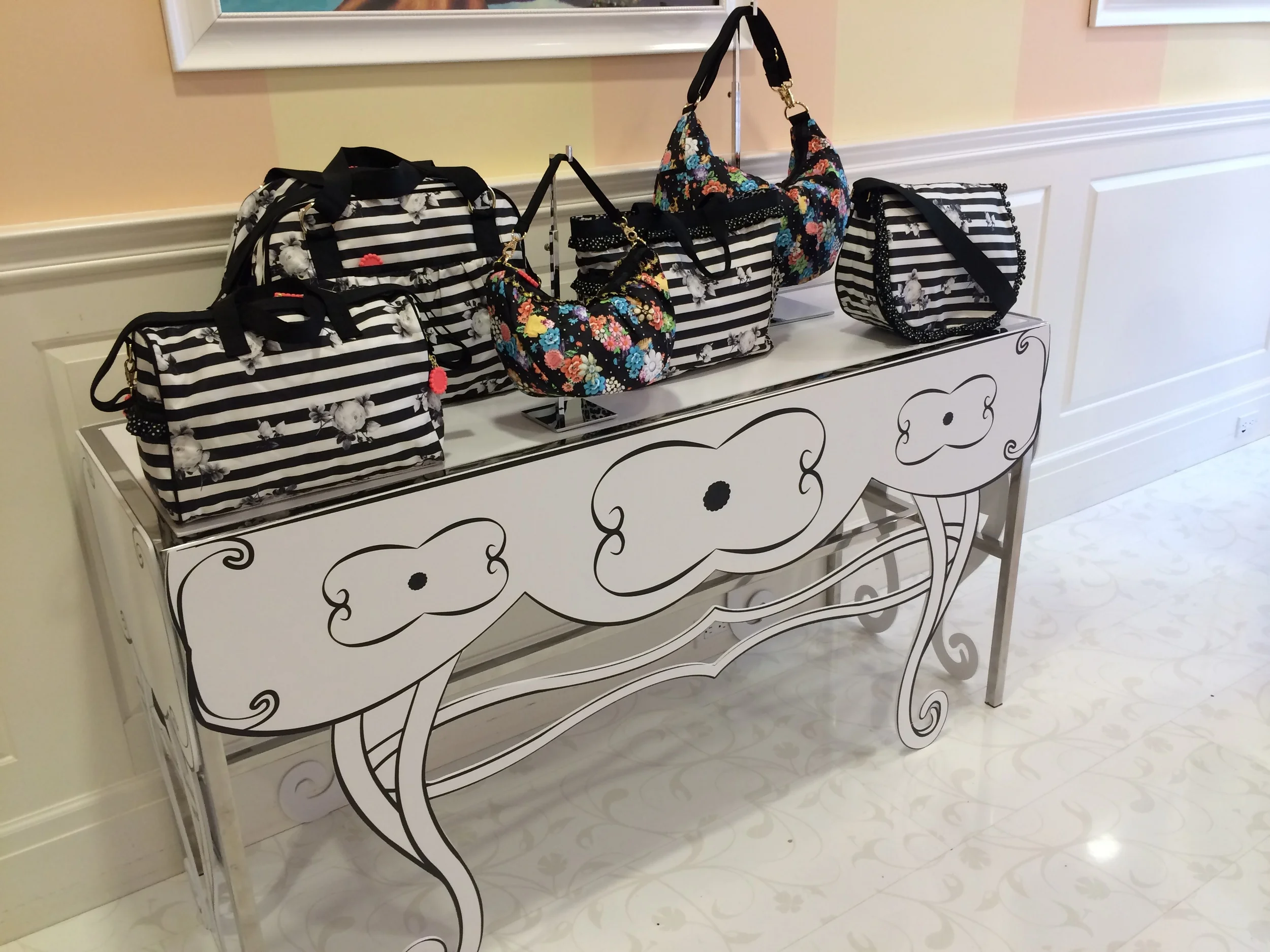 LeSportsac transforms a simple metal table into a POP that would make anyone take a second look. 