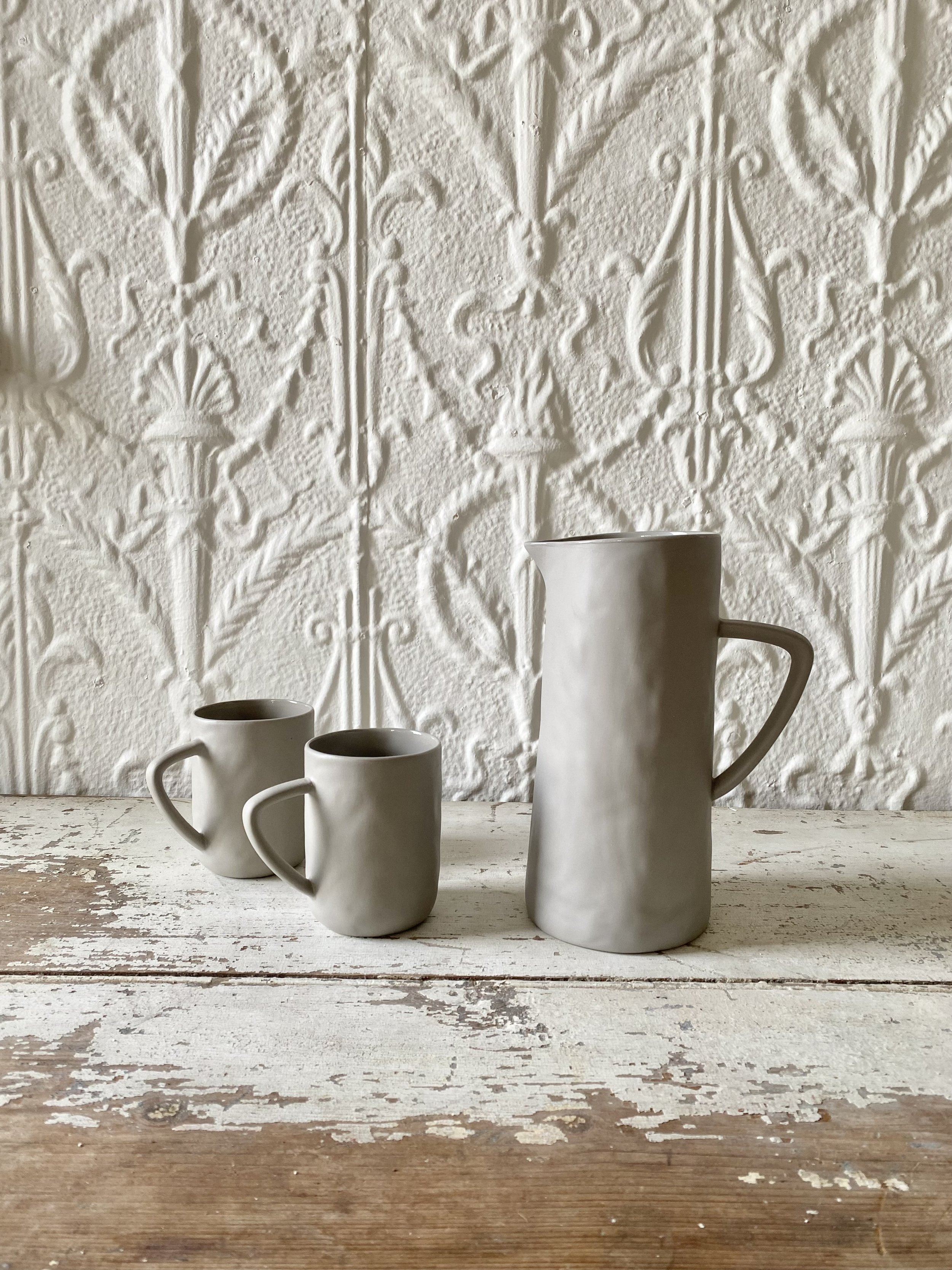 rica bath and body slate grey ceramic mug set and pitcher beach bungalow coastal farmhouse decor