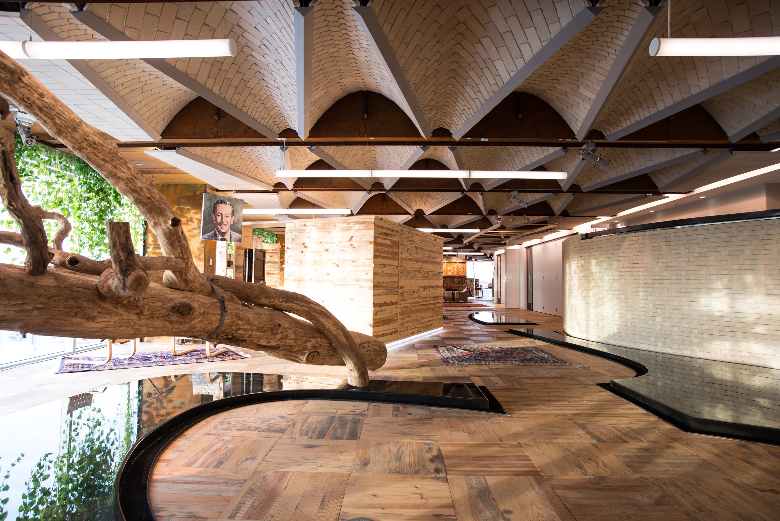 Peter Rich used the beetle-kill pine blanketing the Colorado forests as a foundation for the “village” he built for the employees of the firm.  Design collaboration with Two Hands Interiors.