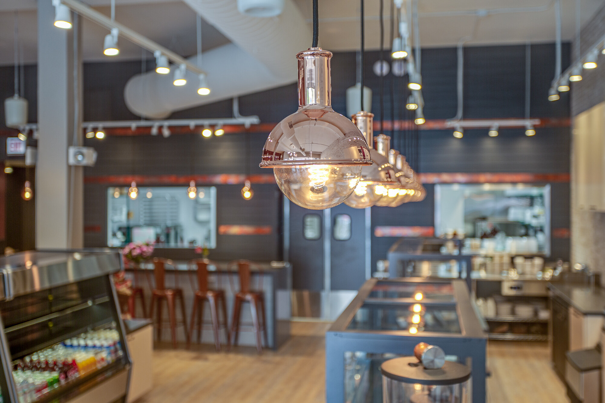 modern restaurant lighting interior design by Two Hands Interiors