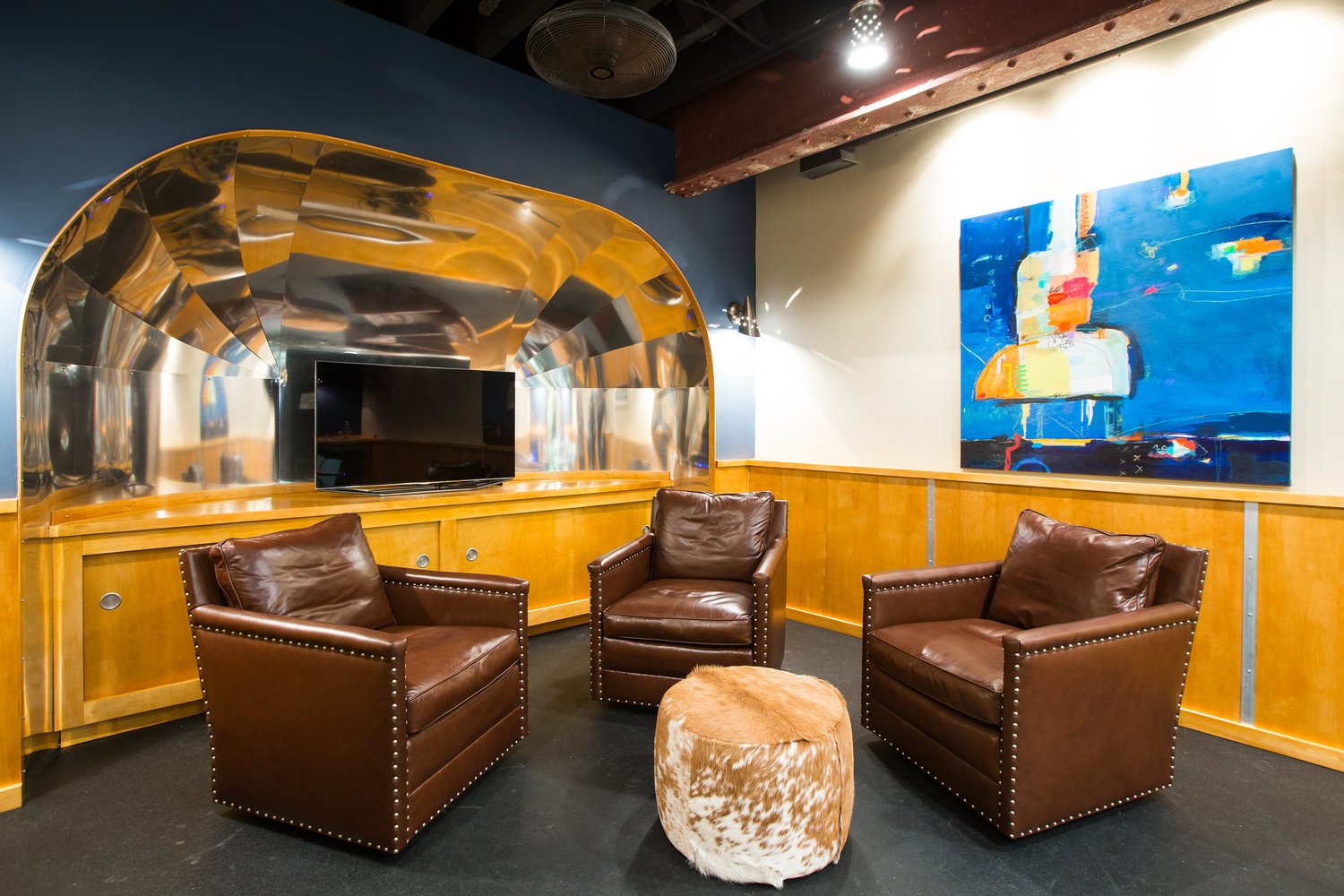 Glen Ellyn conference room design inspired by an airstream. Design by Two Hands interiors.