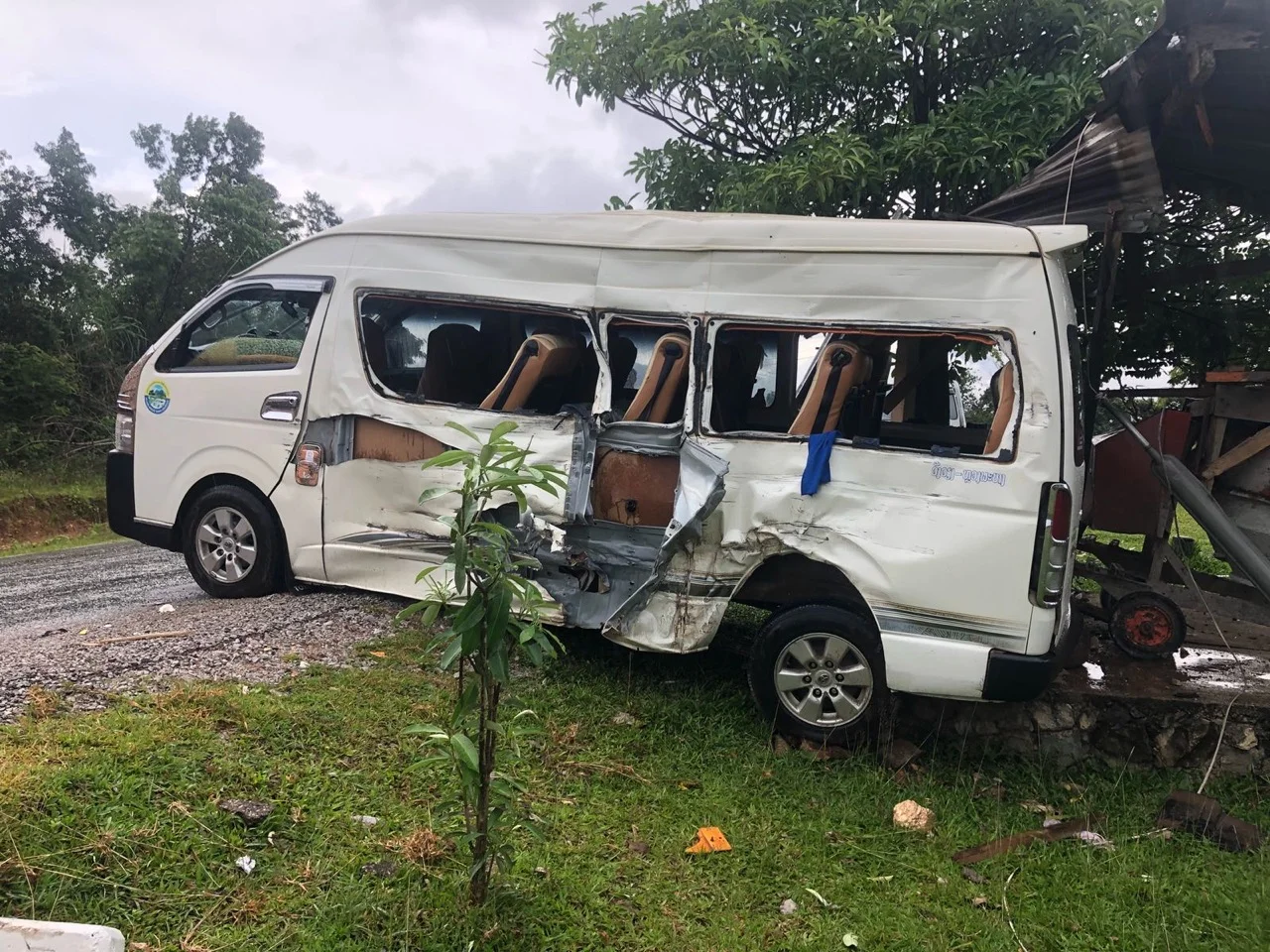 After the car accident in Laos. Taken with Richard’s phone. We climbed out the broken side window. The van was compressed and we had to get our luggage out with a crowbar.