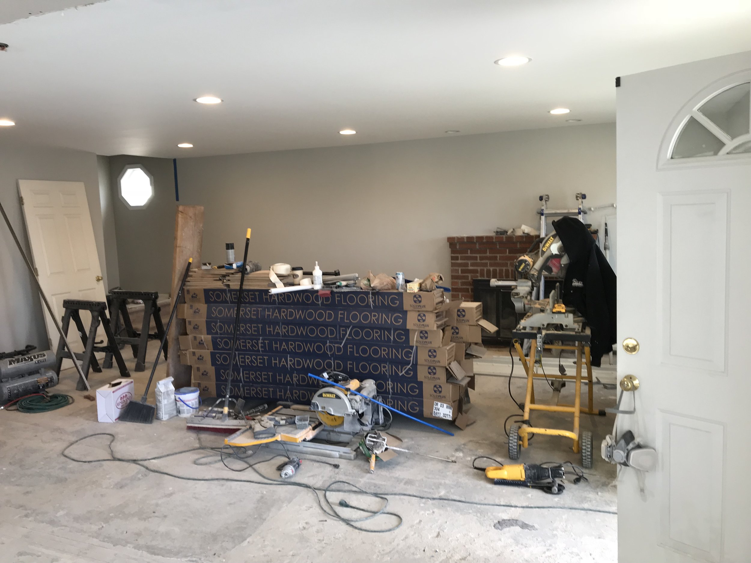  This first floor remodel includes kitchen, living room, and bathroom renovations. The overall project includes demo, framing, installing new insulation, drywall, priming/painting, installing new floors and doors, brand new cabinets and countertops, 