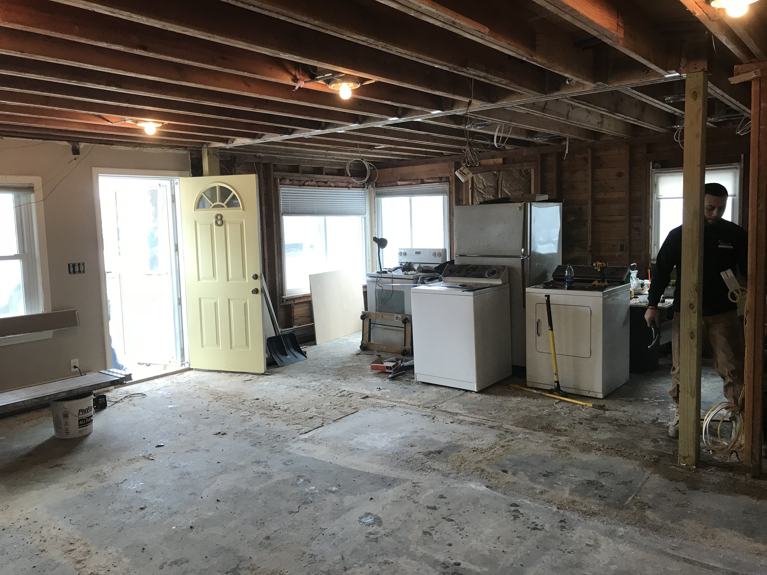  This first floor remodel includes kitchen, living room, and bathroom renovations. The overall project includes demo, framing, installing new insulation, drywall, priming/painting, installing new floors and doors, brand new cabinets and countertops, 