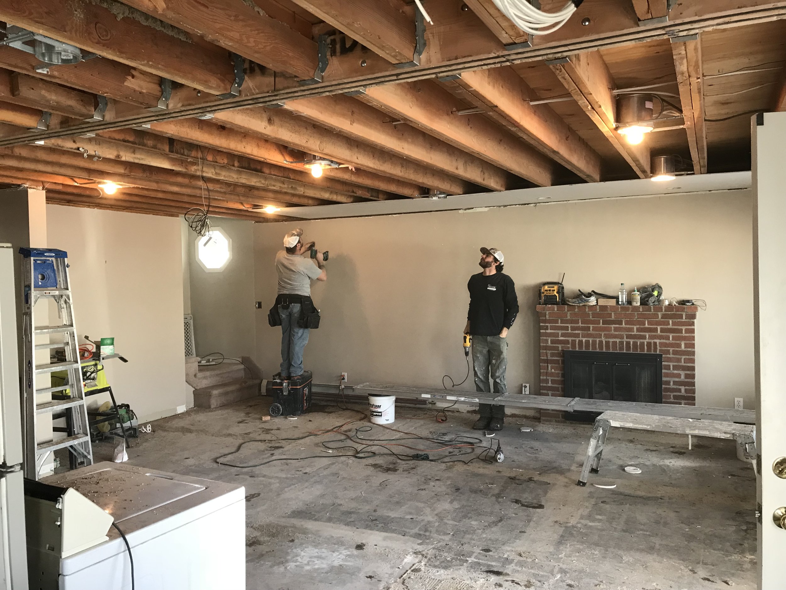 Shaw Remodeling - Progress photo - Kitchen and living room renovations with new ceiling beam - Niantic CT  (3).jpg