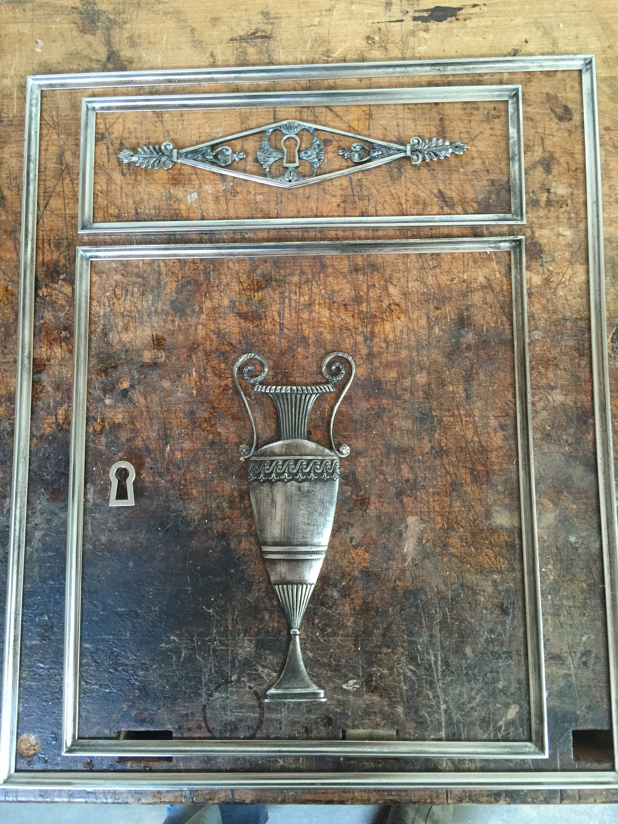 Bronze frames, mounts and escutcheon.